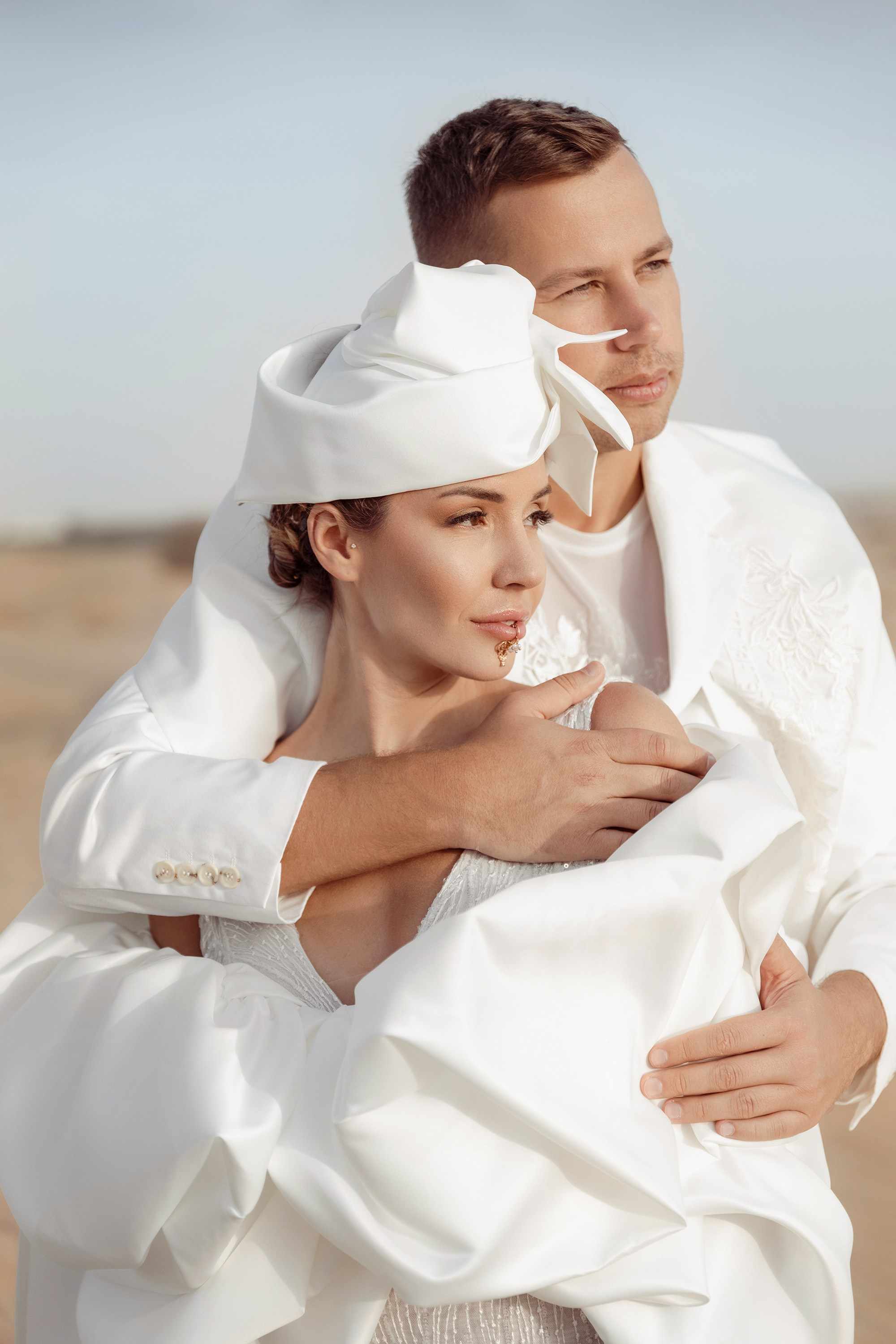 The bride is holding a groom. Dubai, United Arab Emirates
