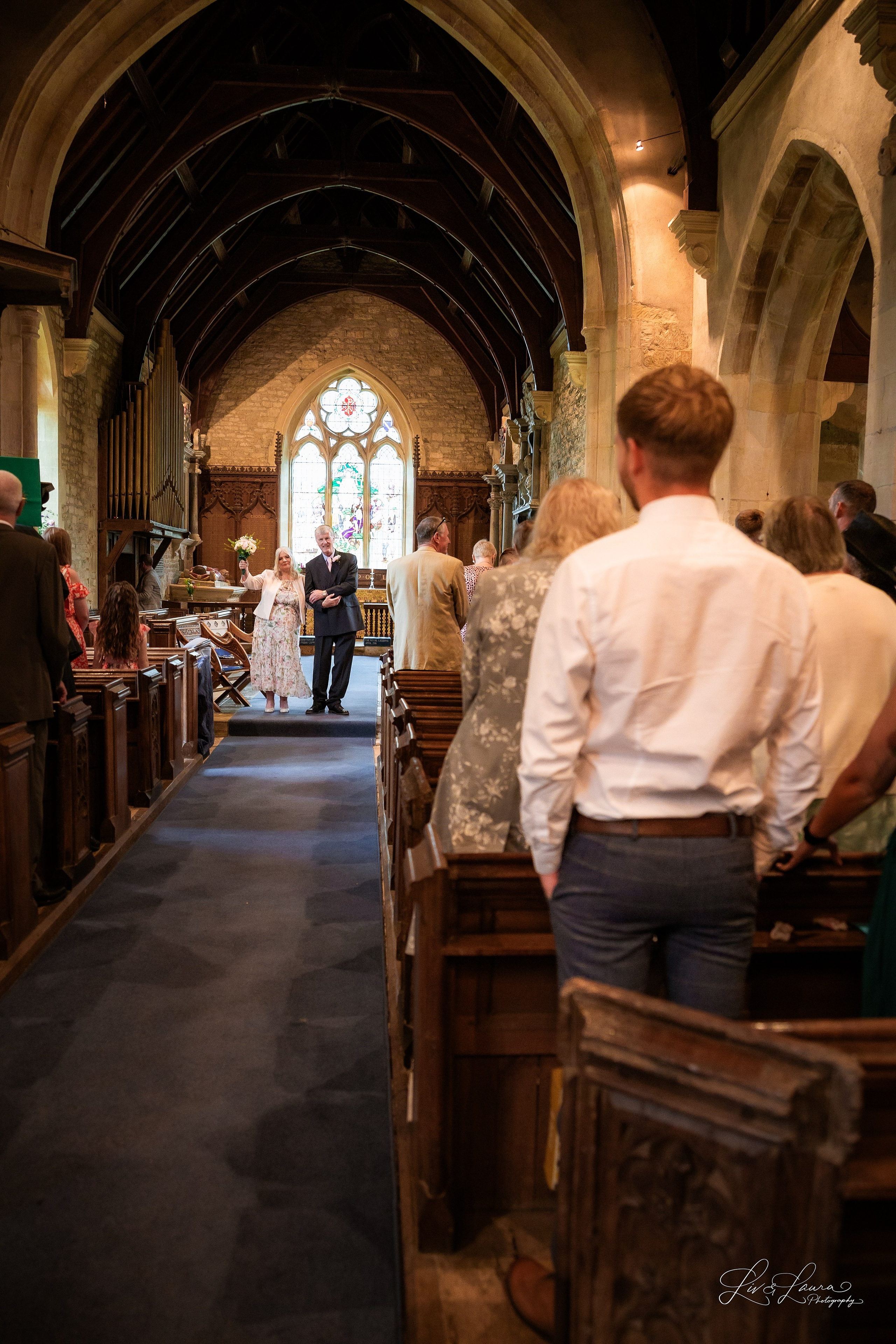 Church Wedding. Wedding and boudoir photography by Liv and Laura