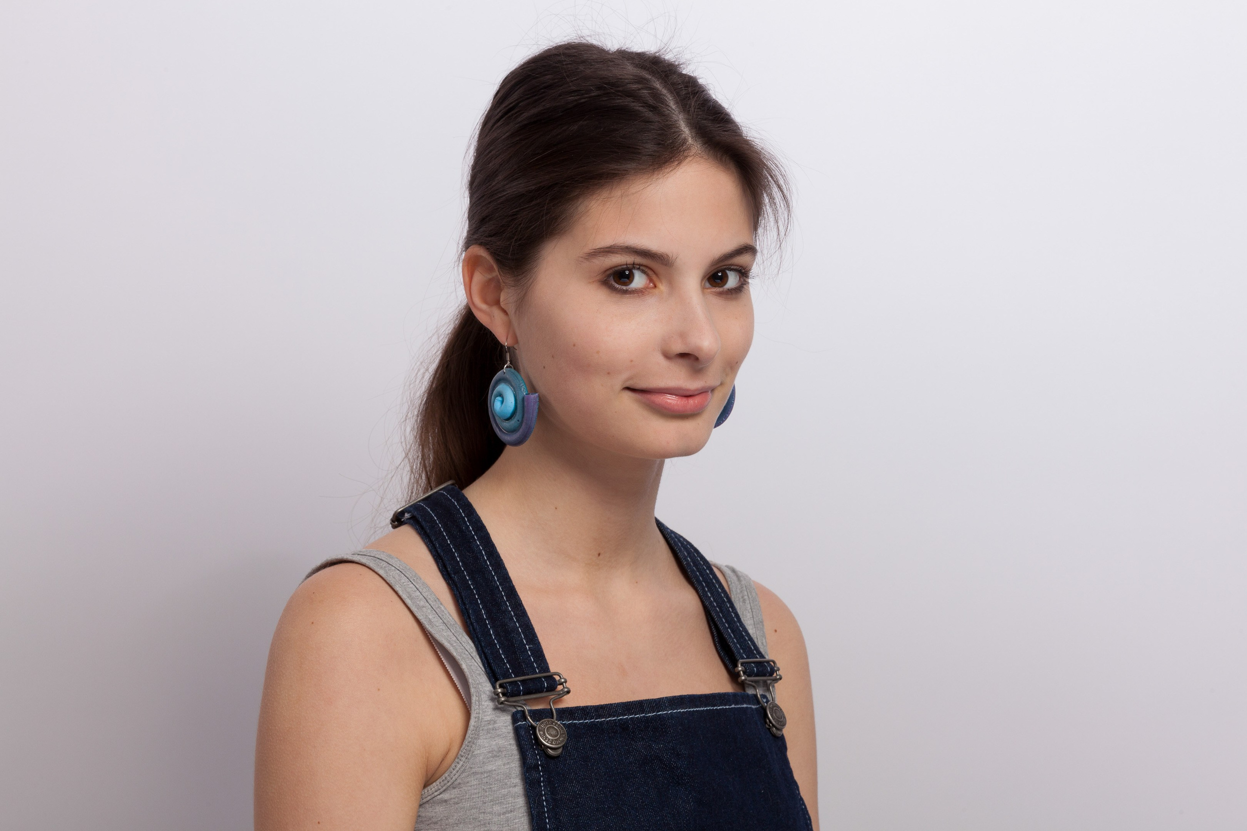 Portrait of a young girl on white studio background - photographer Andrey Dunin