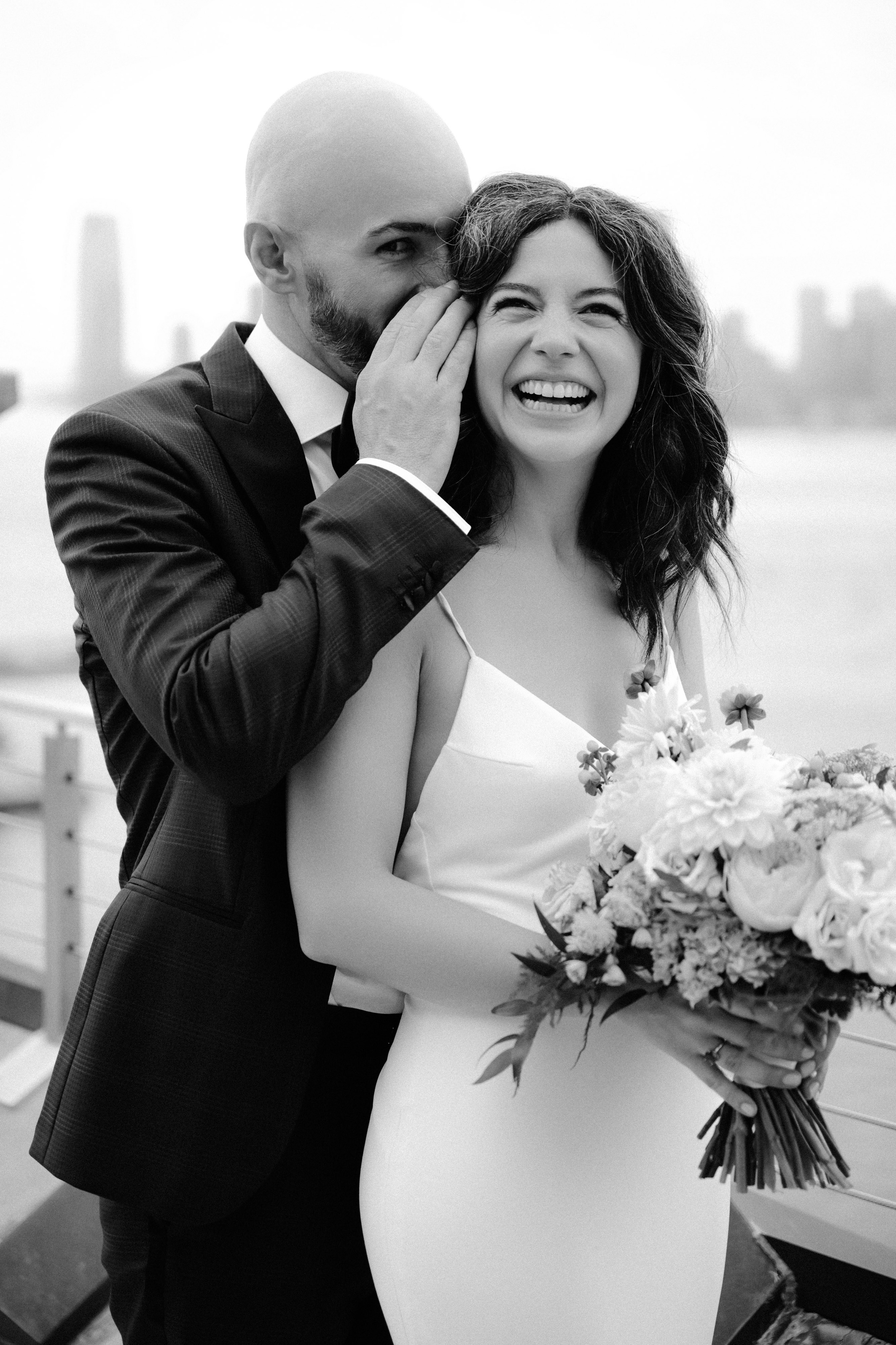 a bride and groom are posing for a photo