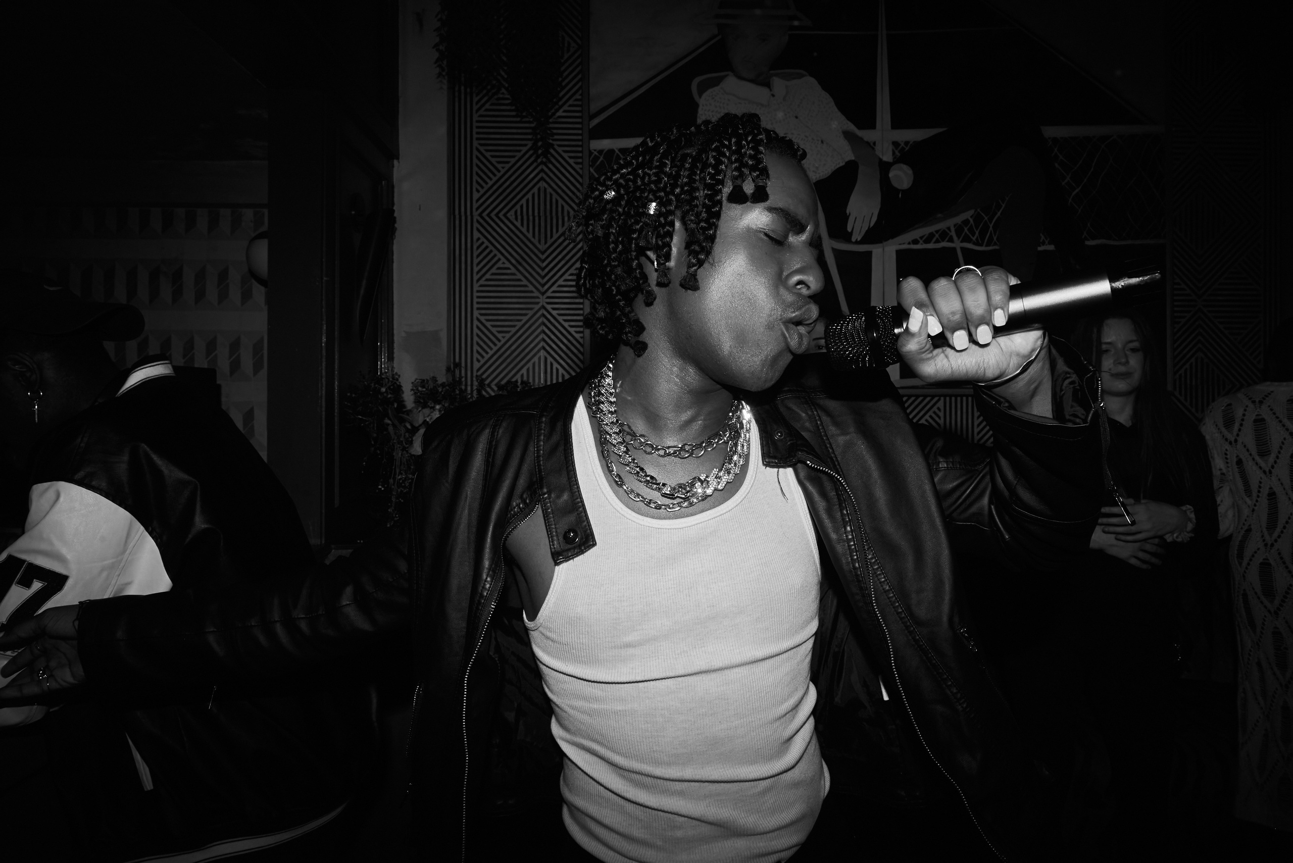 Alik Bulan sings at a concert