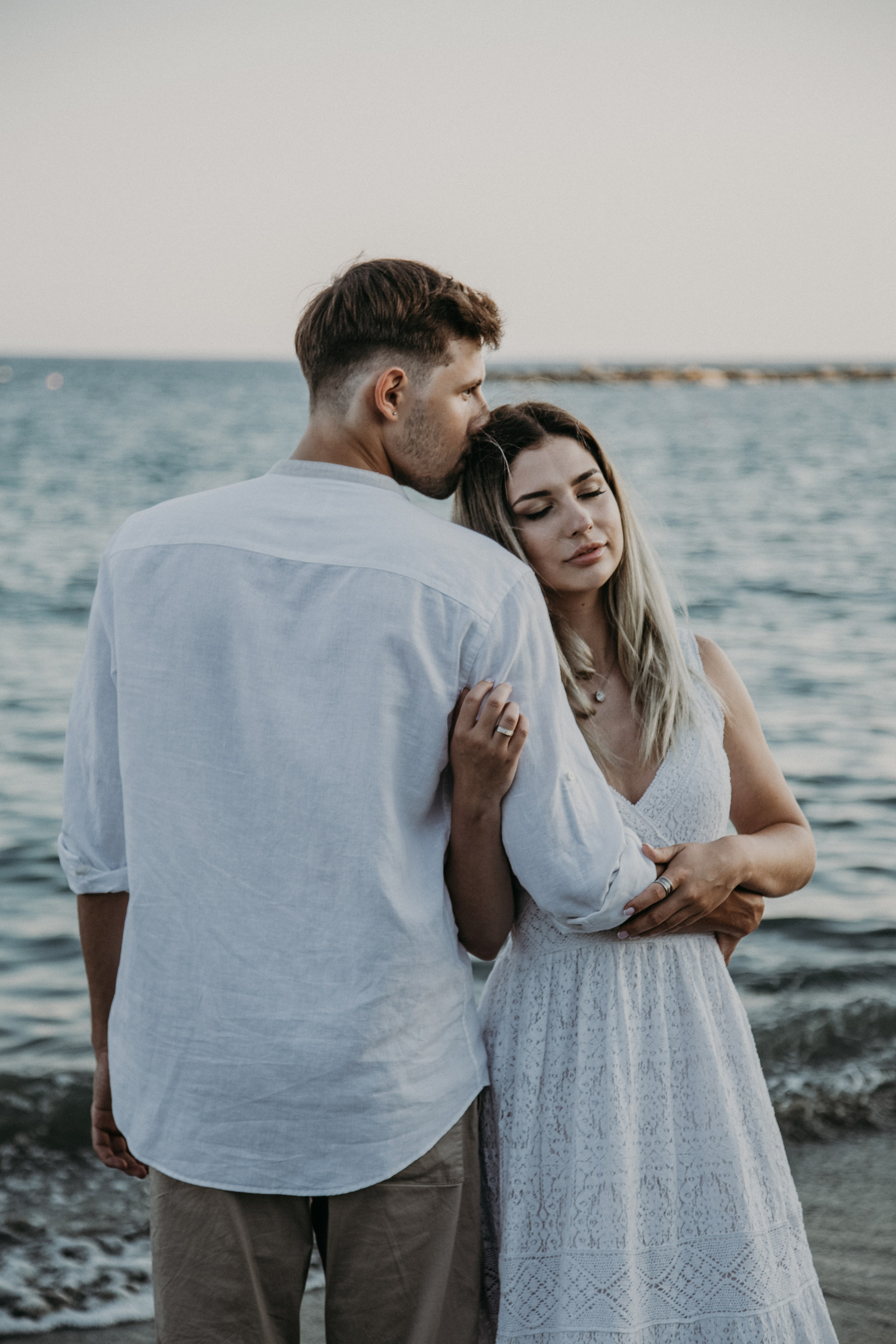 Lovely Young Couple Captured on a Beach Walk Near Limassol | Katya Chu Photography. Photographer in Barcelona capturing unique stories | Kate Chumak
