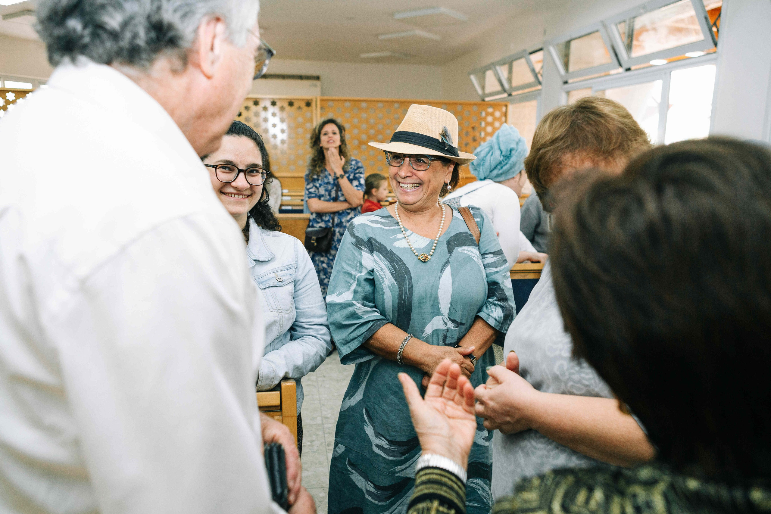 BRITH MILA IN THE SMALL SYNAGOGUE. PHOTOGRAPHER IN ISRAEL