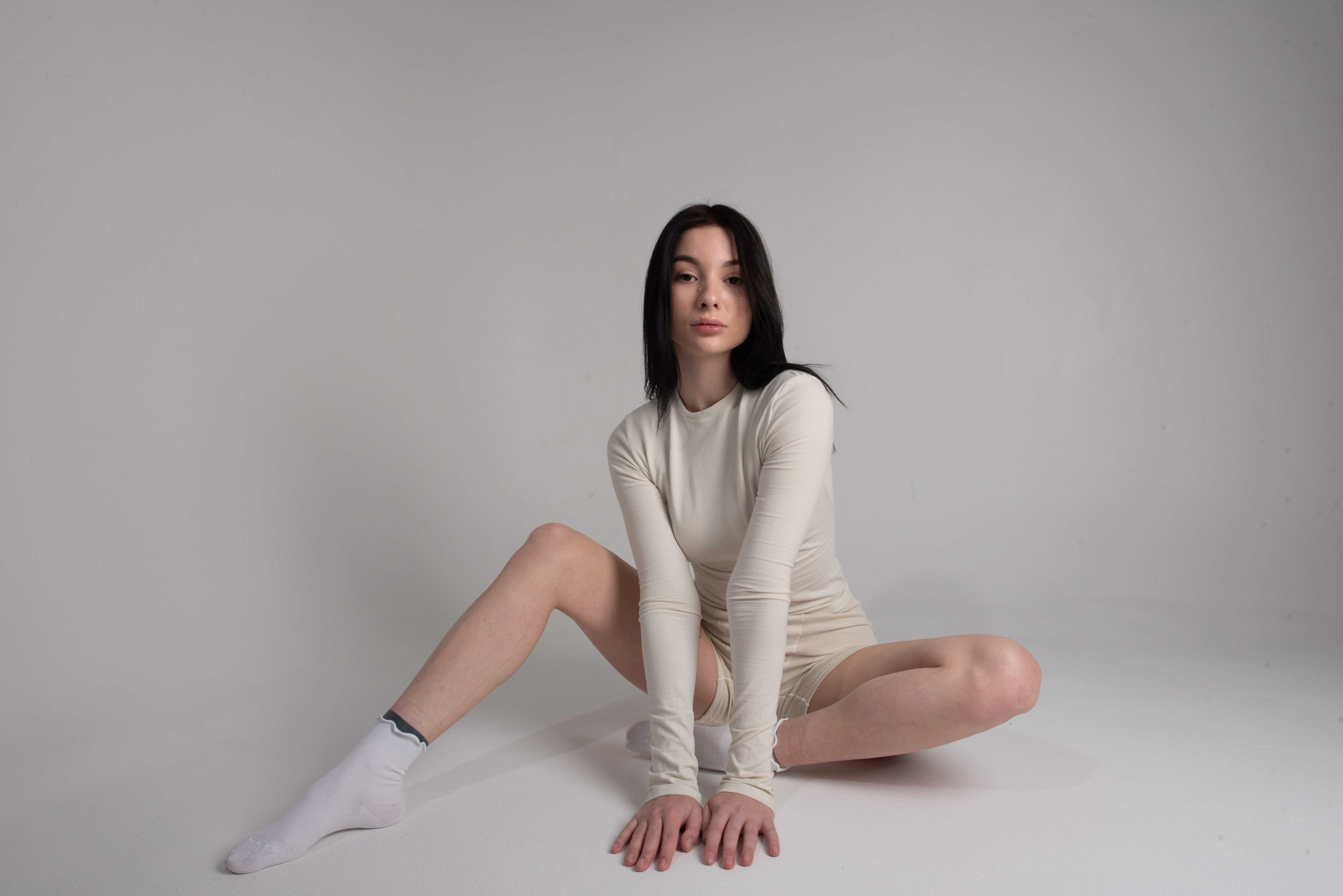 Girl on white background nude photo