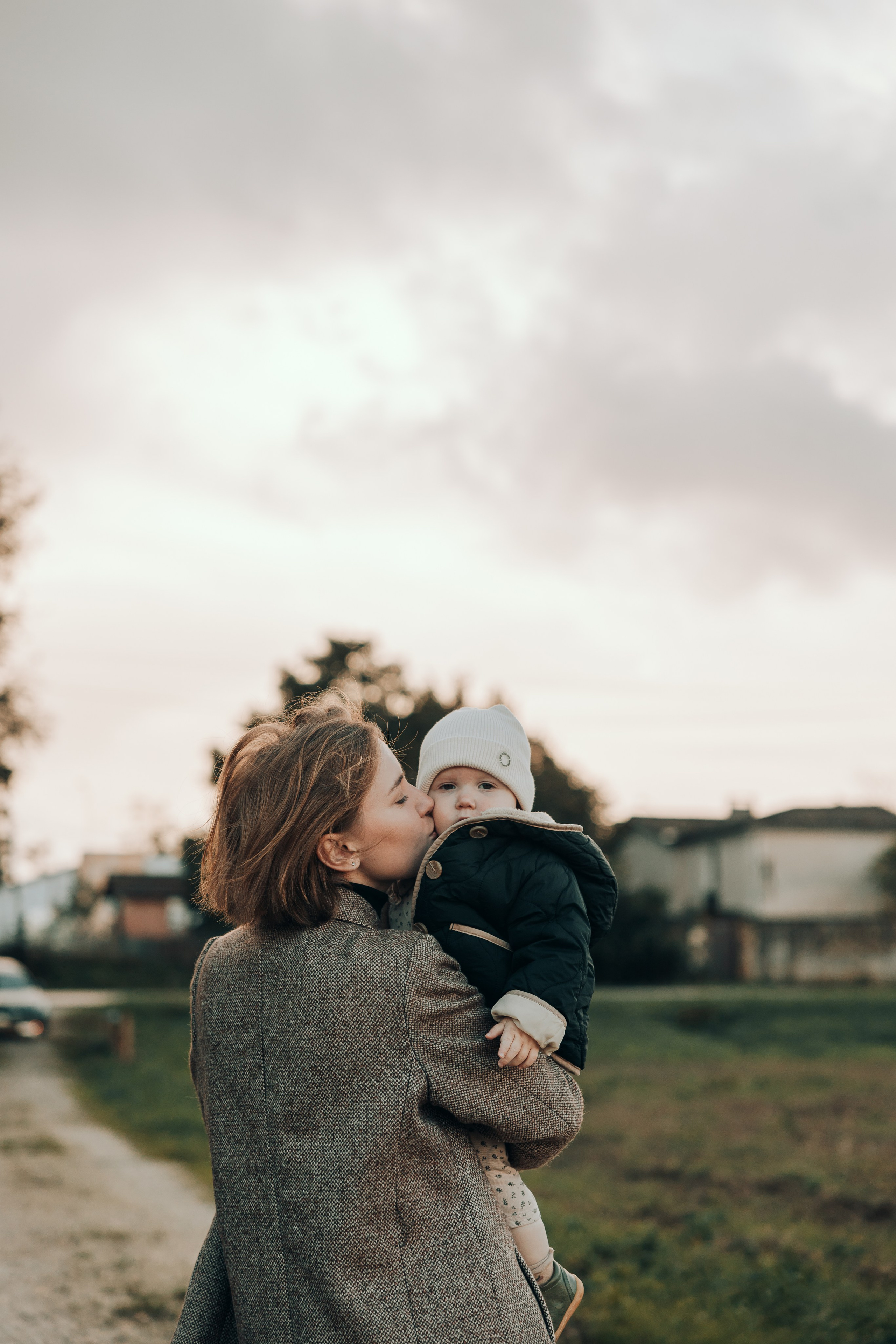Mother with her daughter in autumn, family photo