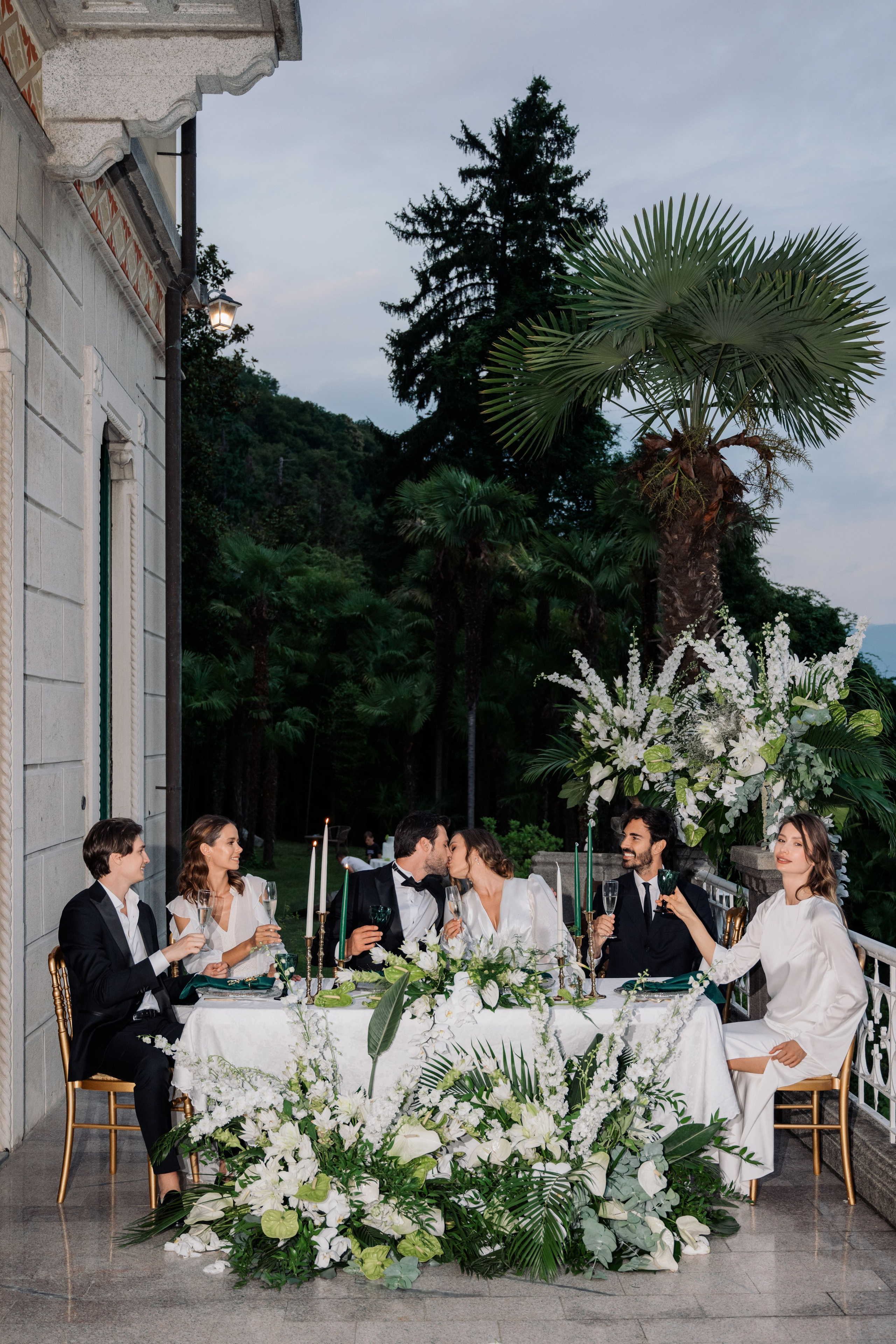 a wedding party with a table set up