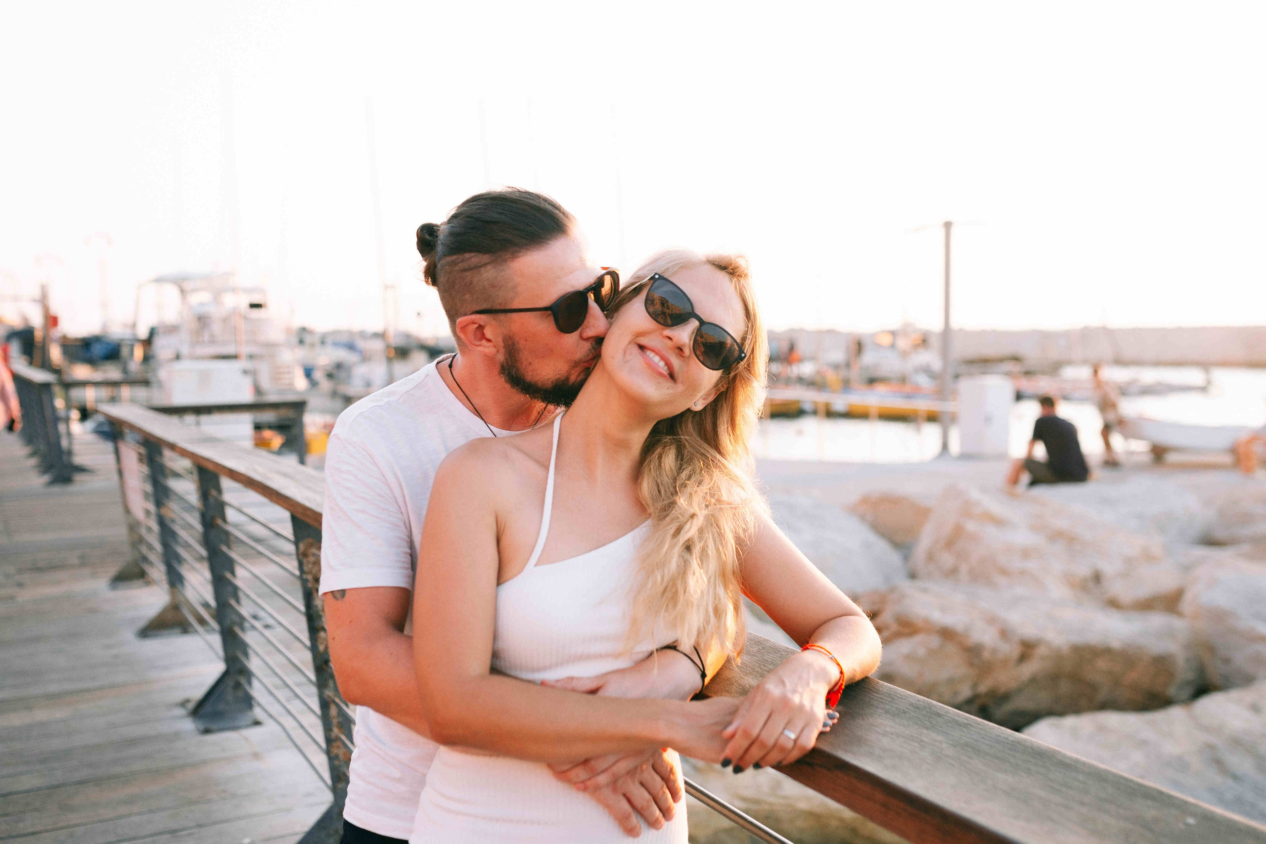 SUNSET IN JAFFO PORT. PHOTOGRAPHER IN ISRAEL