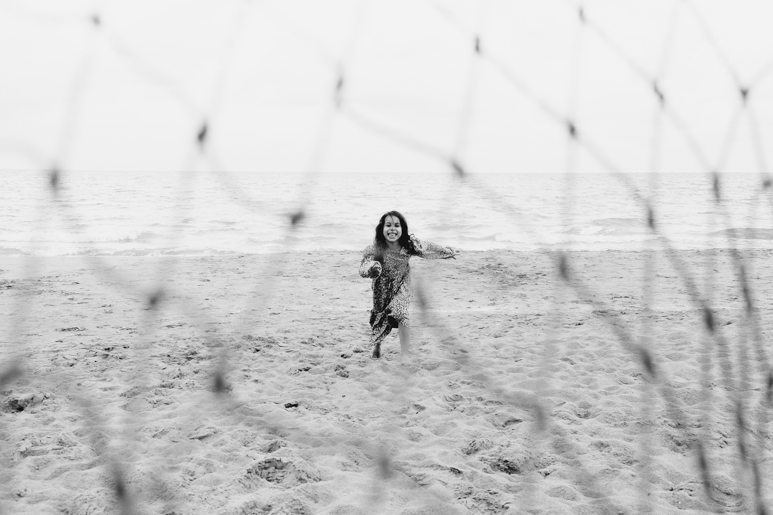 Fun family photo session on the beach