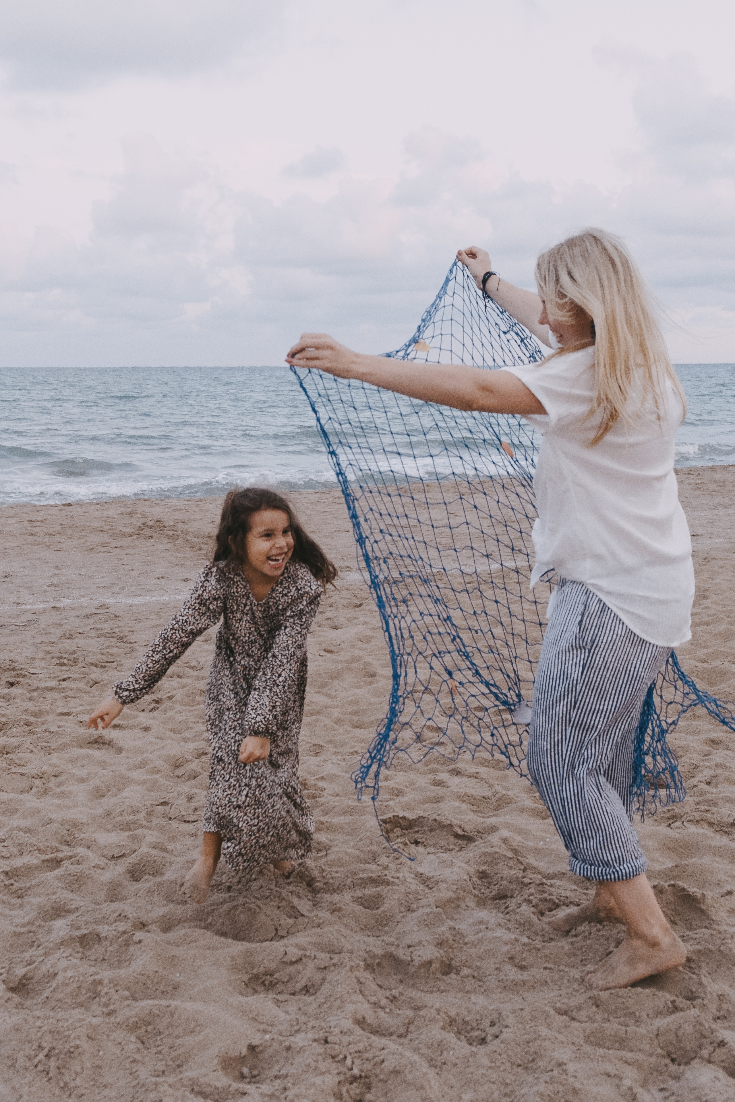 Fun family photo session on the beach