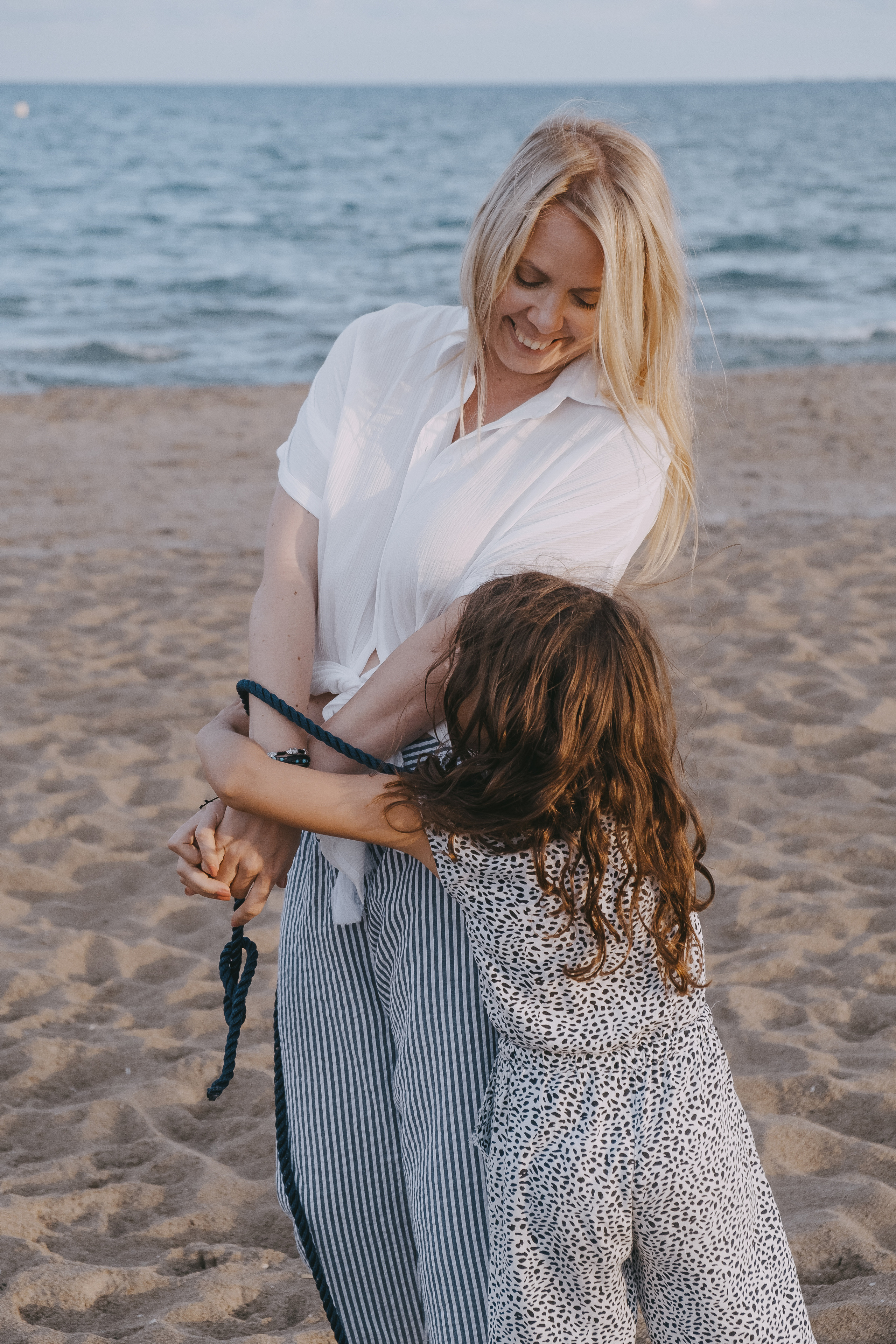Fun family photo session on the beach