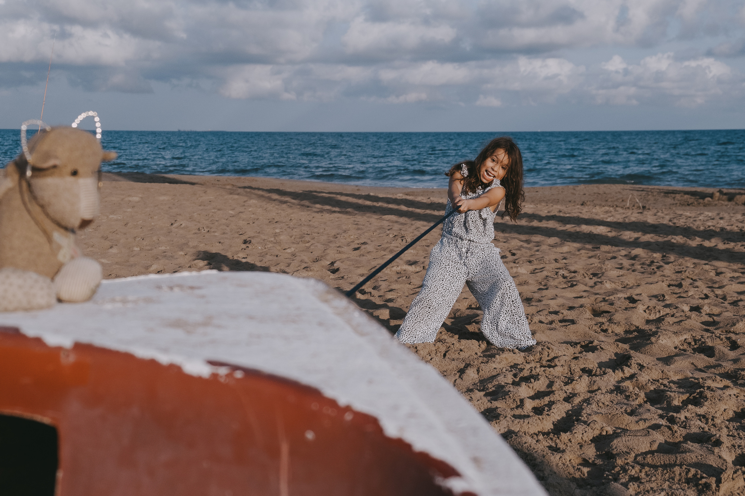 Fun family photo session on the beach