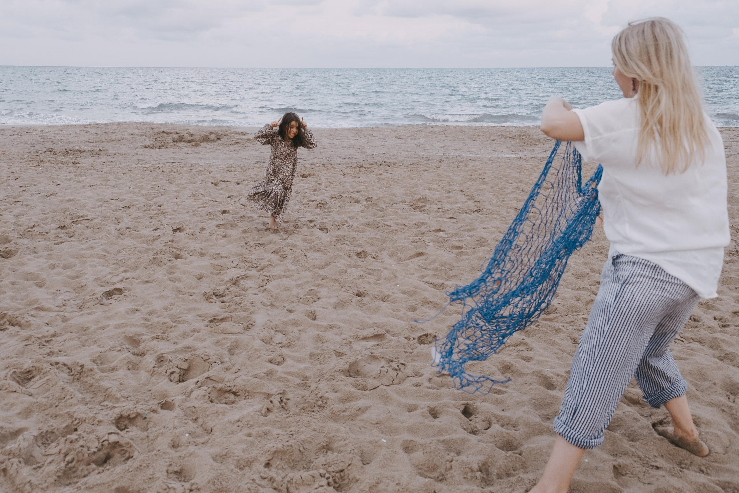 Fun family photo session on the beach