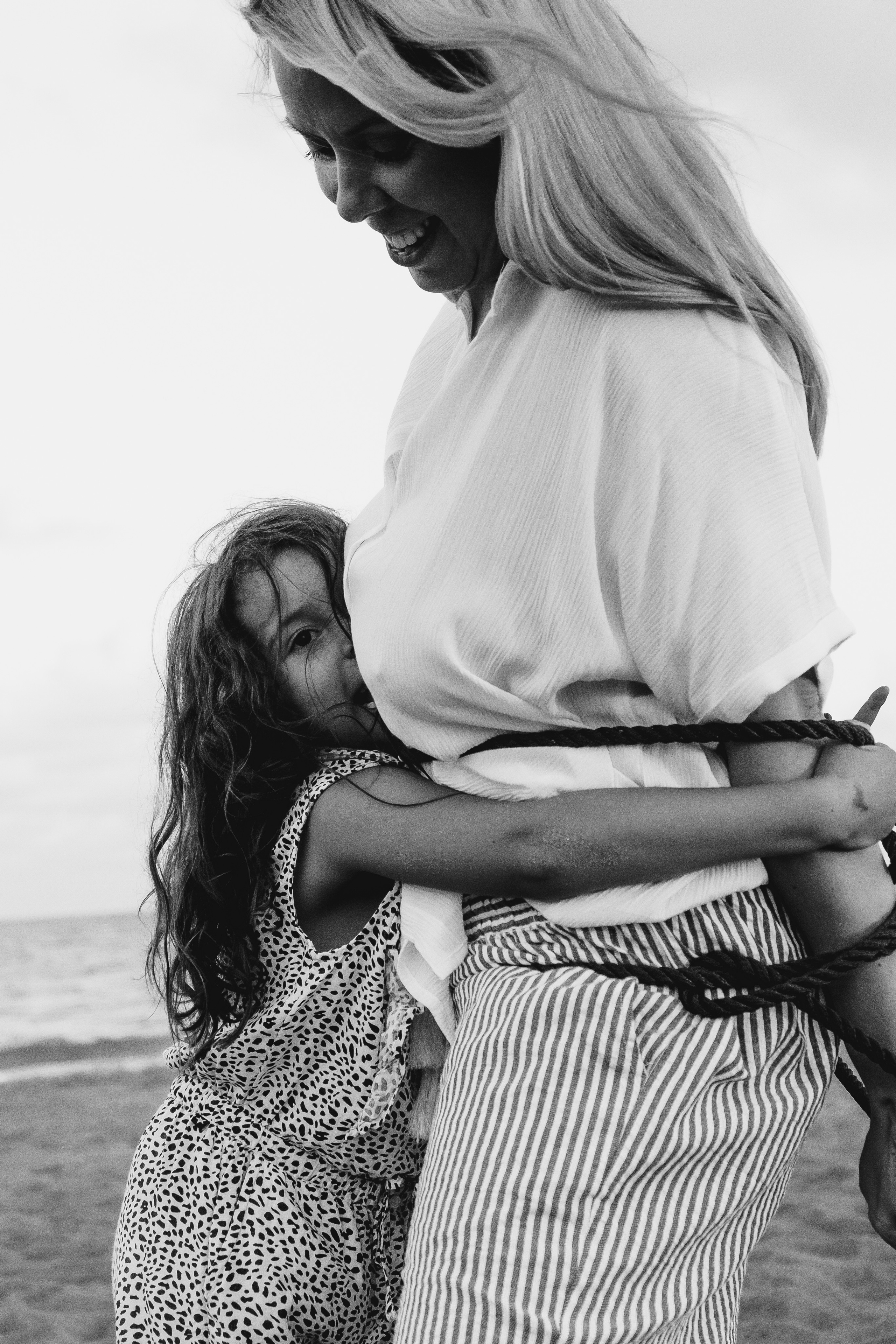 Fun family photo session on the beach