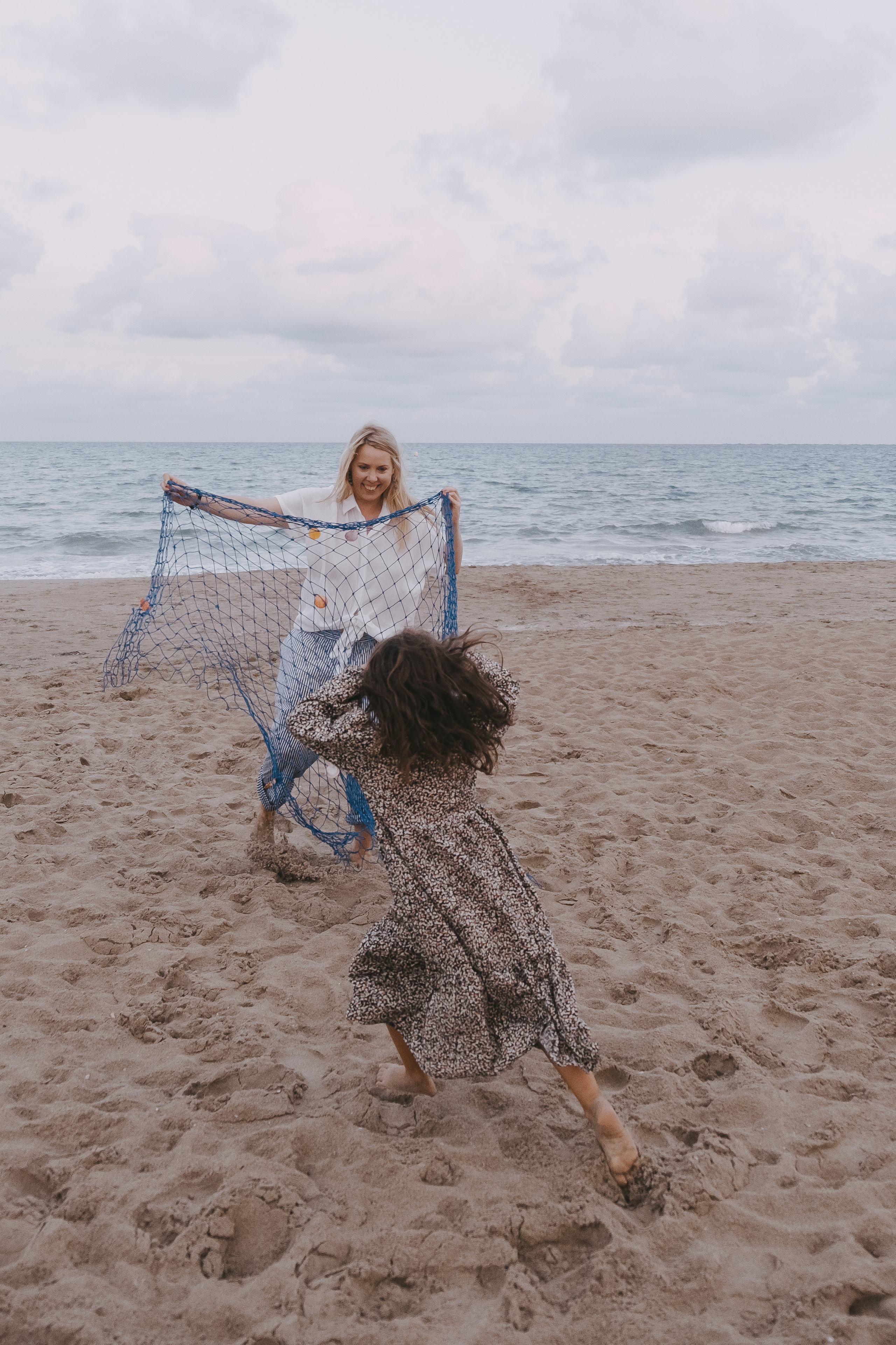 Fun family photo session on the beach