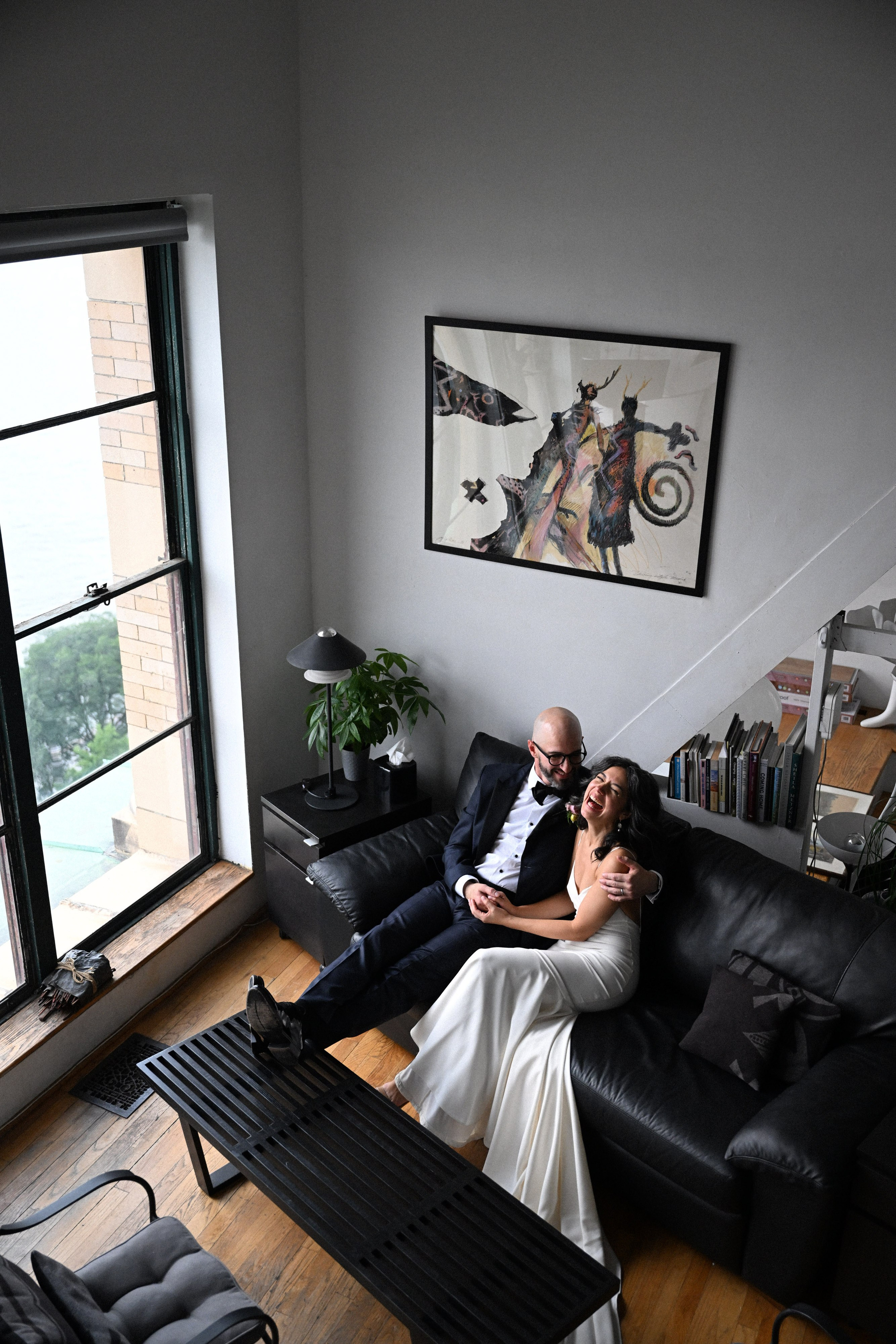 a man and woman sitting on a couch