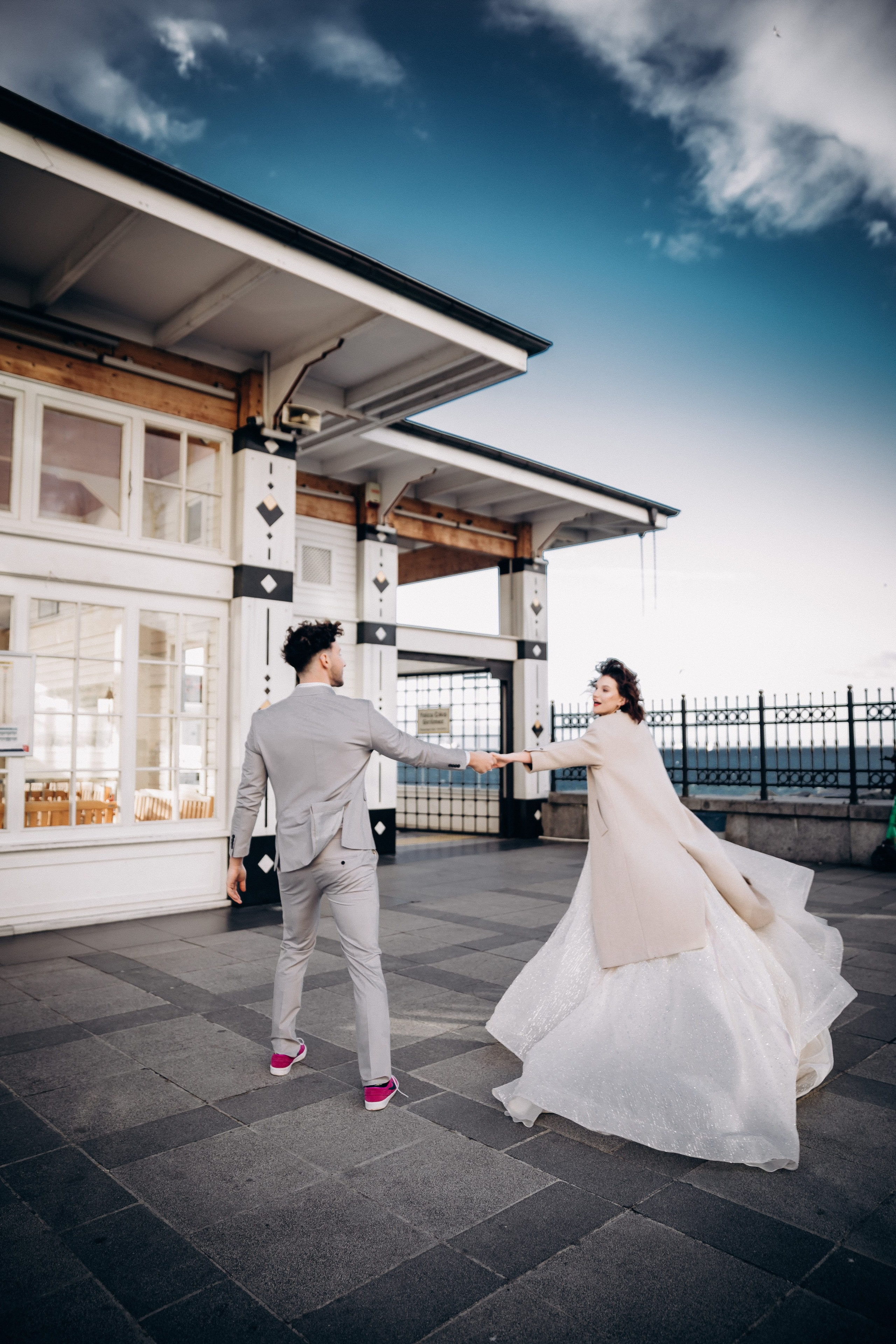 Bride and groom portrait by Bosphorus sunset – European wedding photo & video.
