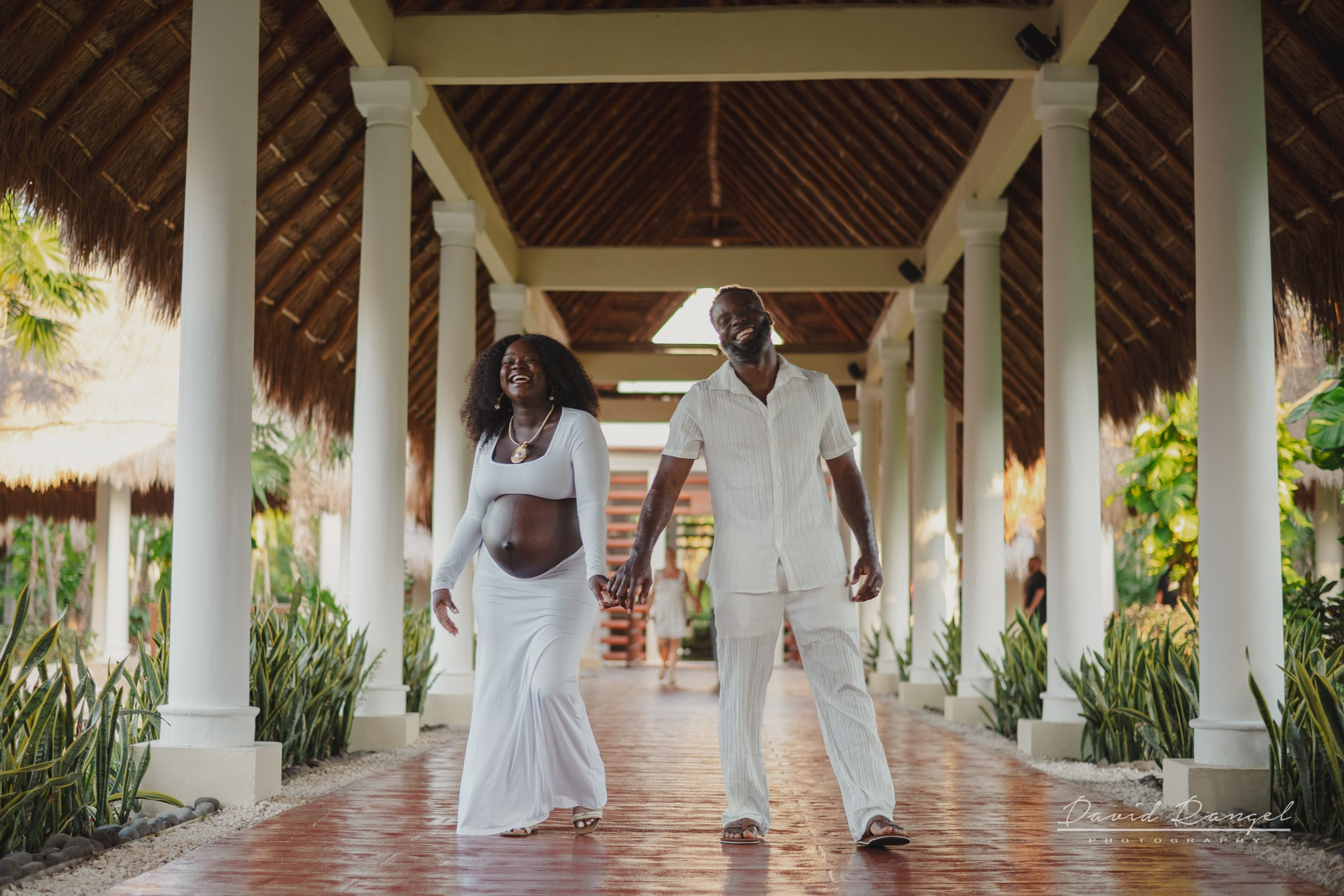 Maternity session of Ketsia & Ricketson at the beautiful colonial-style Valentin Imperial Maya Hotel. Destination wedding photographer based in Cancun and Riviera Maya with service worldwide
