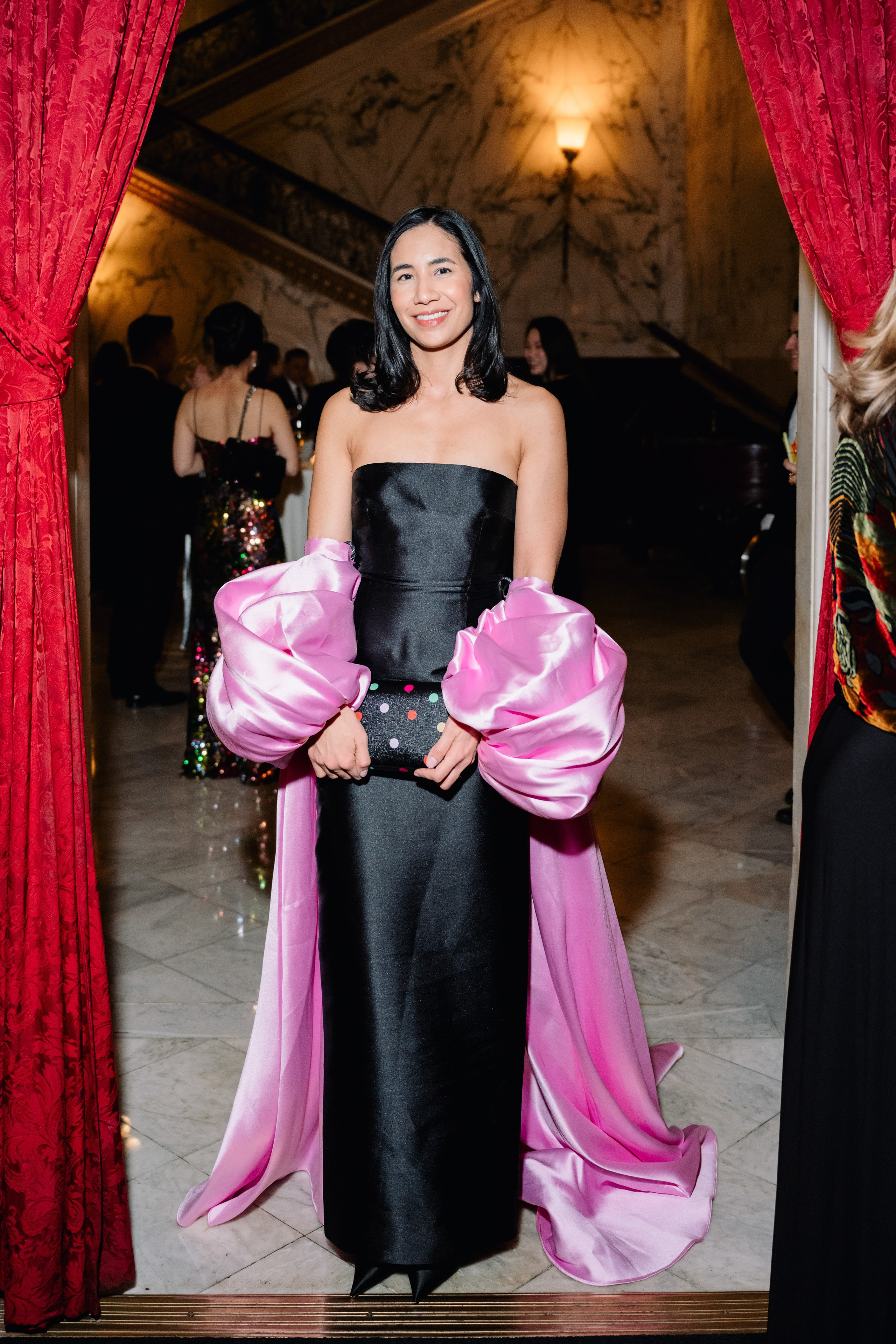 a woman in a black dress