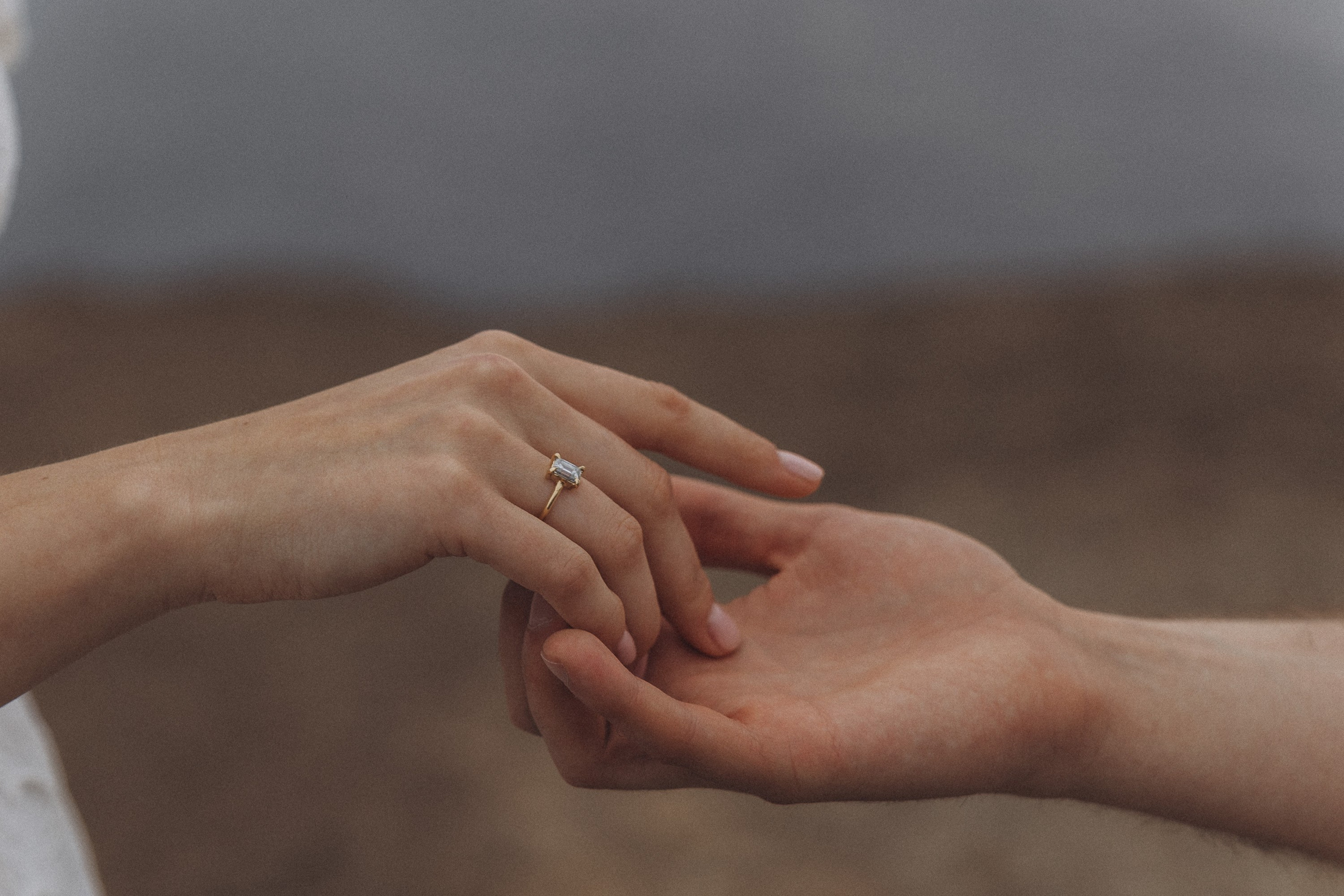 Surprise marriage proposal in São Lourenço, Madeira – romantic couple photography on dramatic coastal cliffs