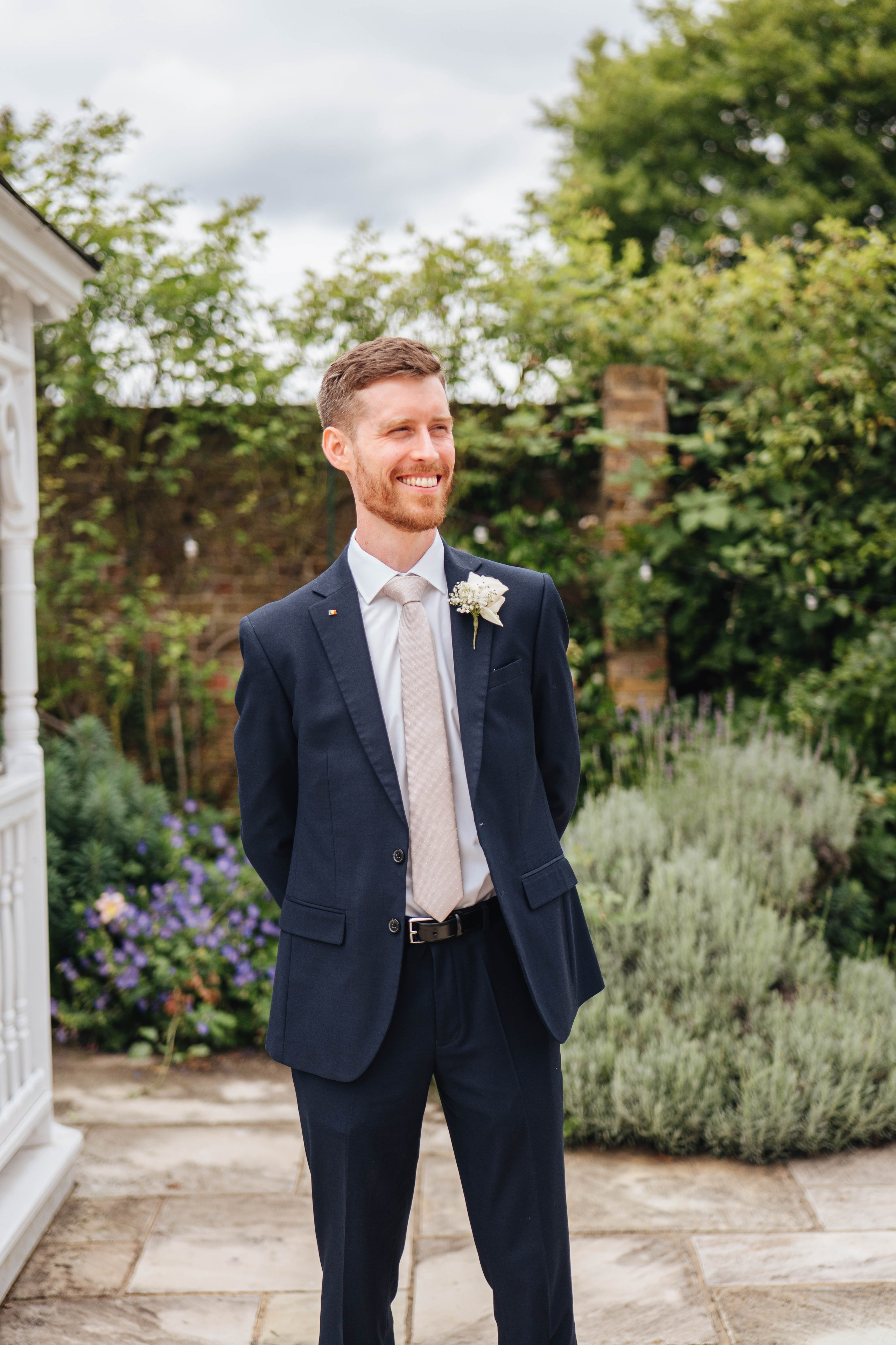 groom meeting bride and her father at the venue