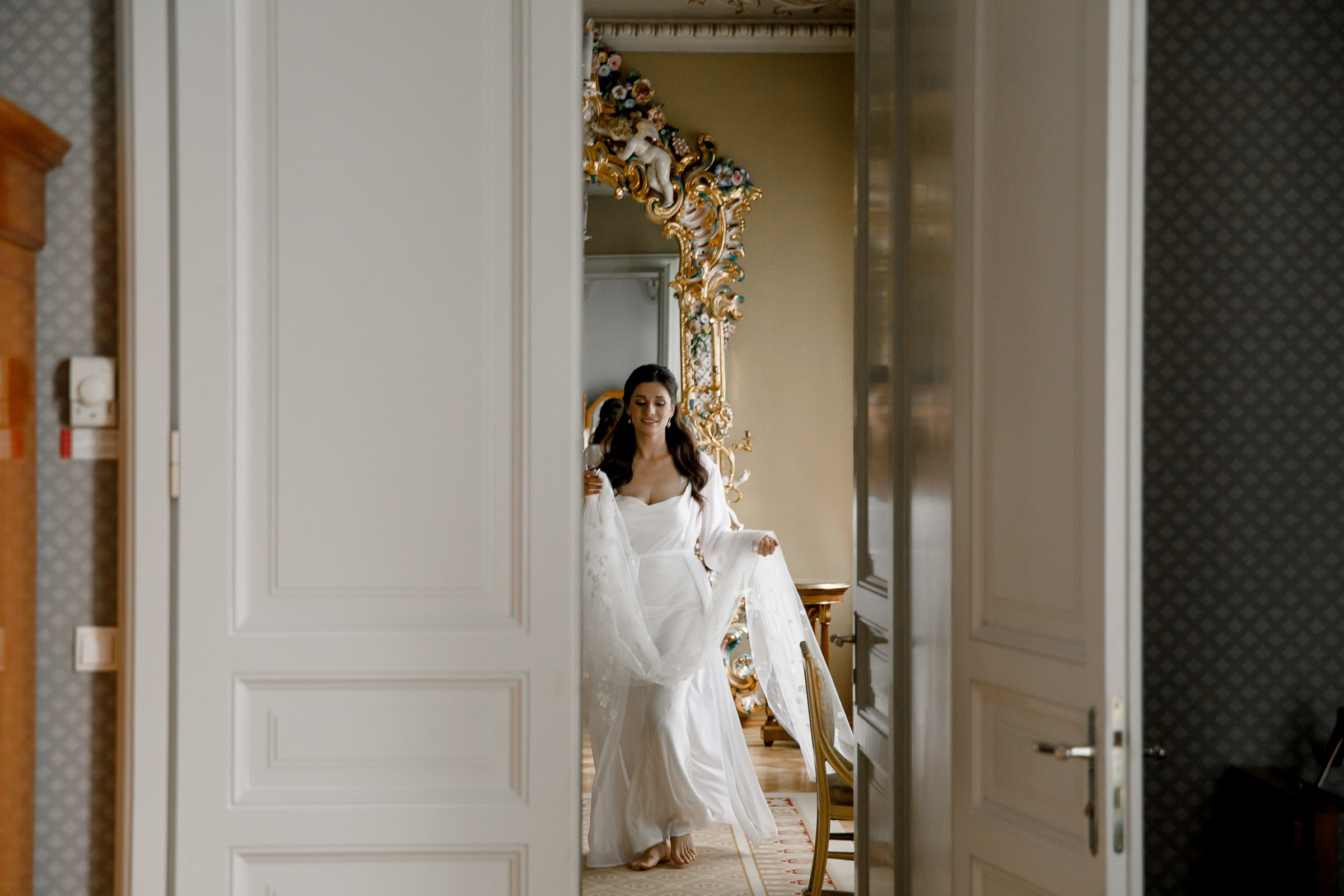 Bride’s candid prep moment, by Bude, Cornwall wedding photographer.