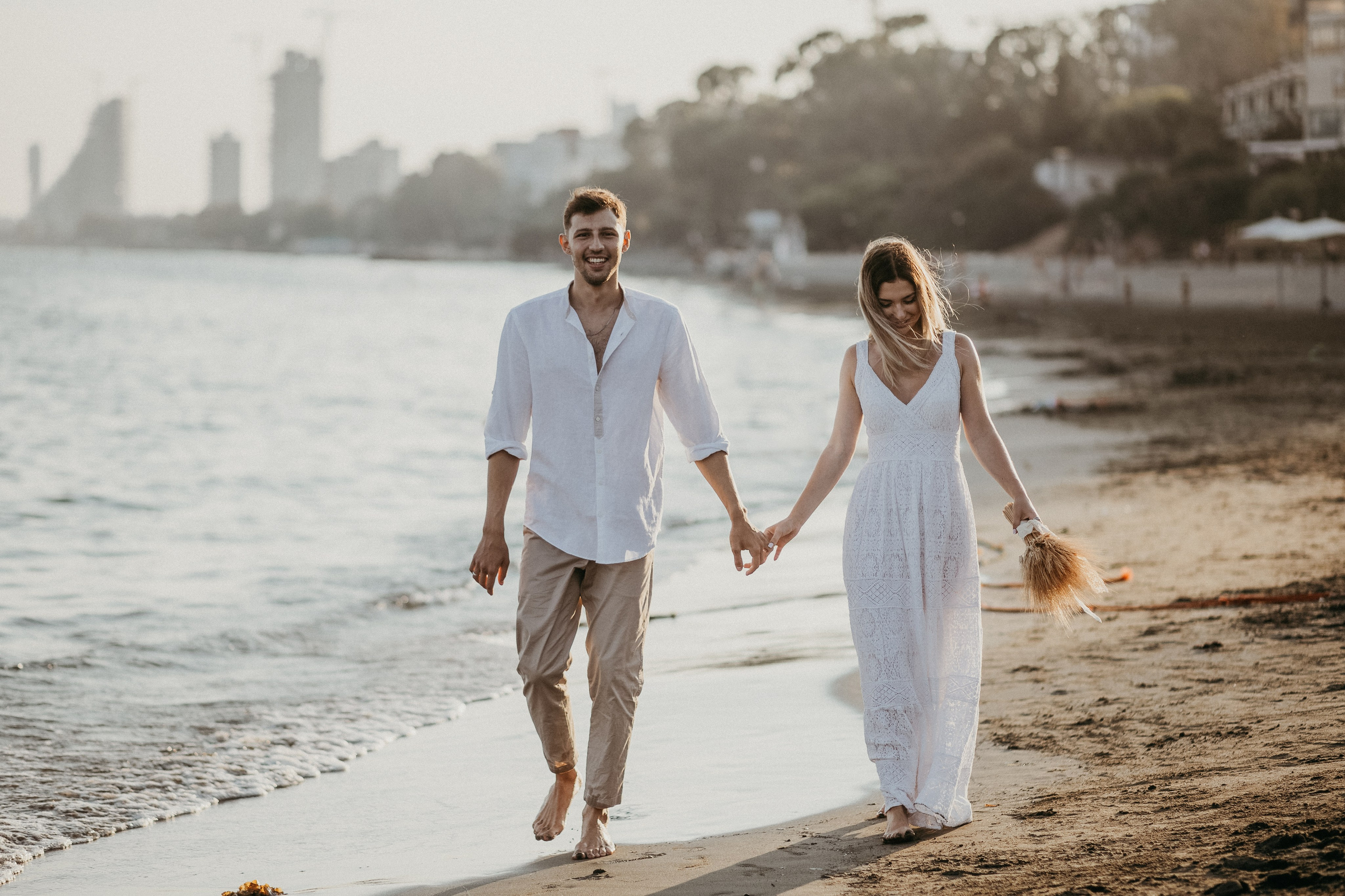 Lovely Young Couple Captured on a Beach Walk Near Limassol | Katya Chu Photography. Photographer in Barcelona capturing unique stories | Kate Chumak