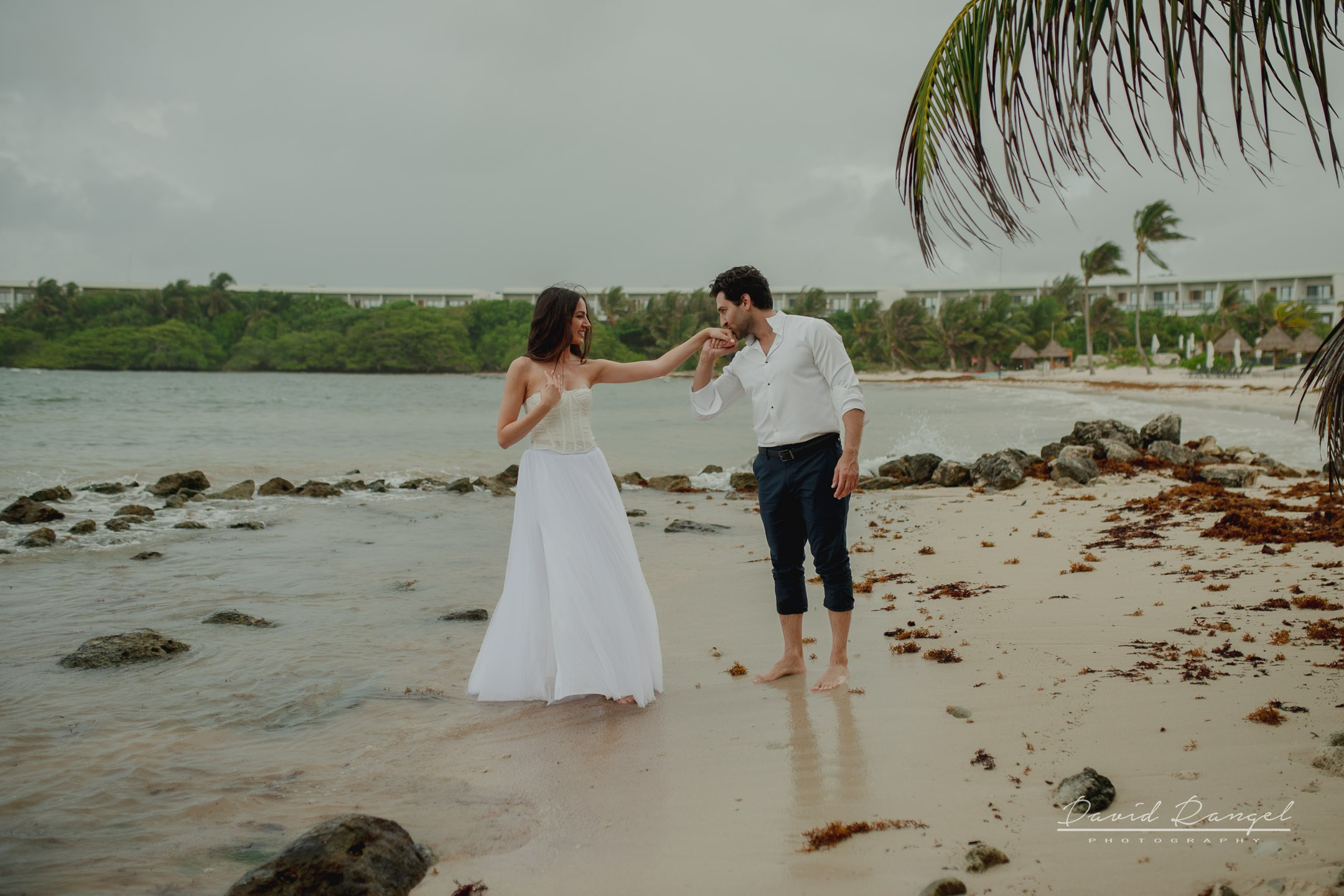 Secilia and Brandon tras the dress at the Conrad Tulum Hotel. Destination wedding photographer based in Cancun and Riviera Maya with service worldwide