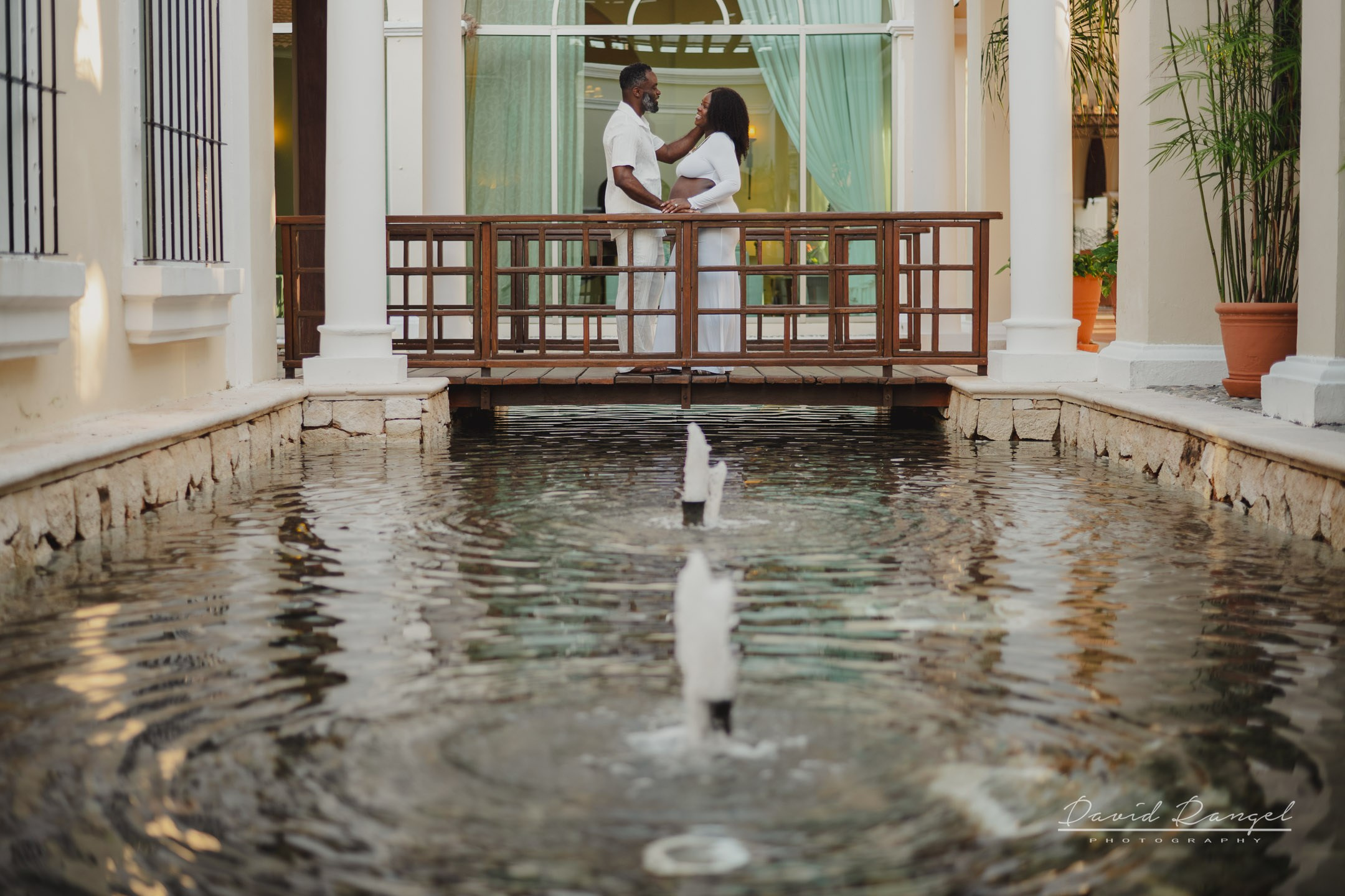 Maternity session of Ketsia & Ricketson at the beautiful colonial-style Valentin Imperial Maya Hotel. Destination wedding photographer based in Cancun and Riviera Maya with service worldwide