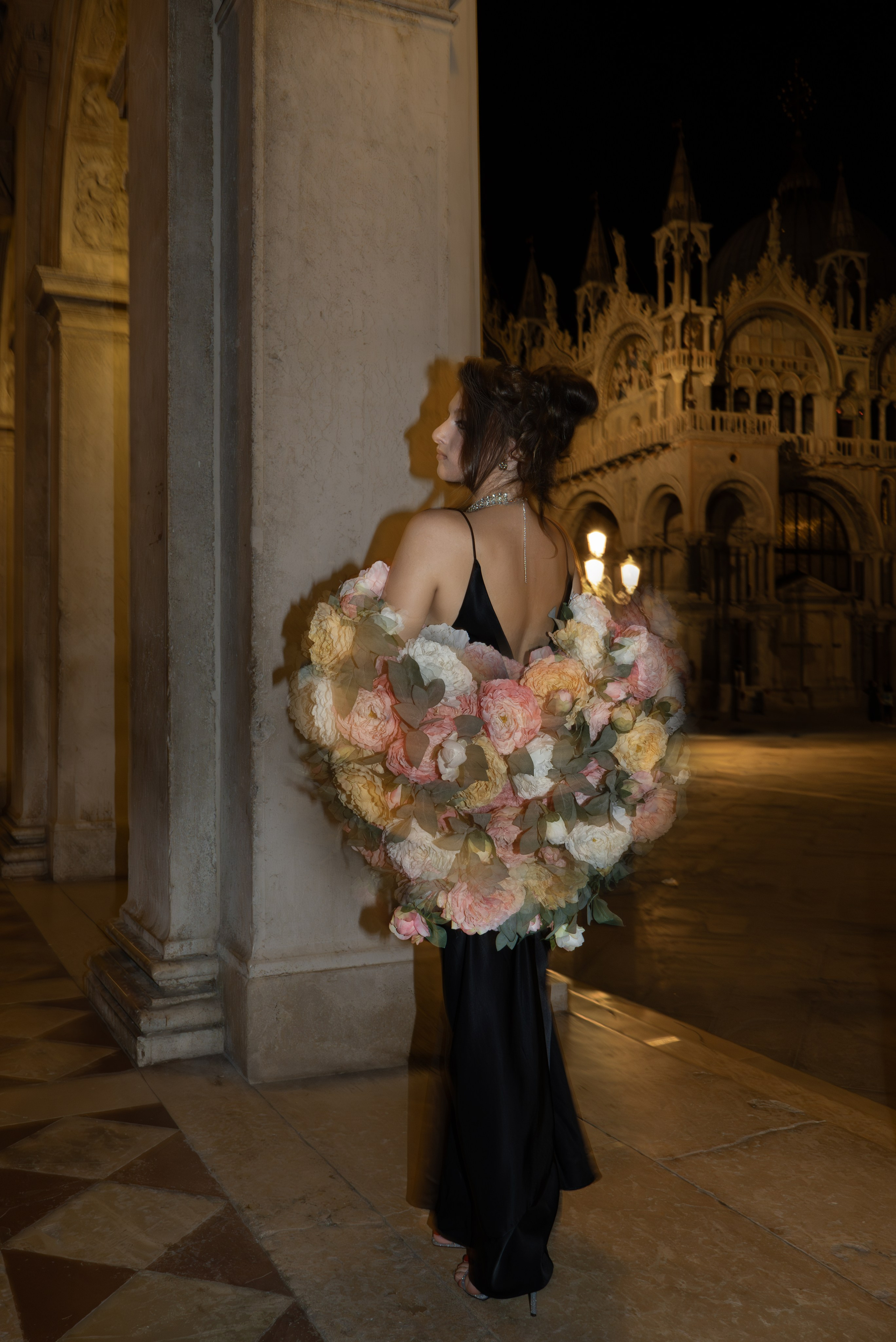 Branding photoshoot Venice for blogger in silk dress near Grand Canal