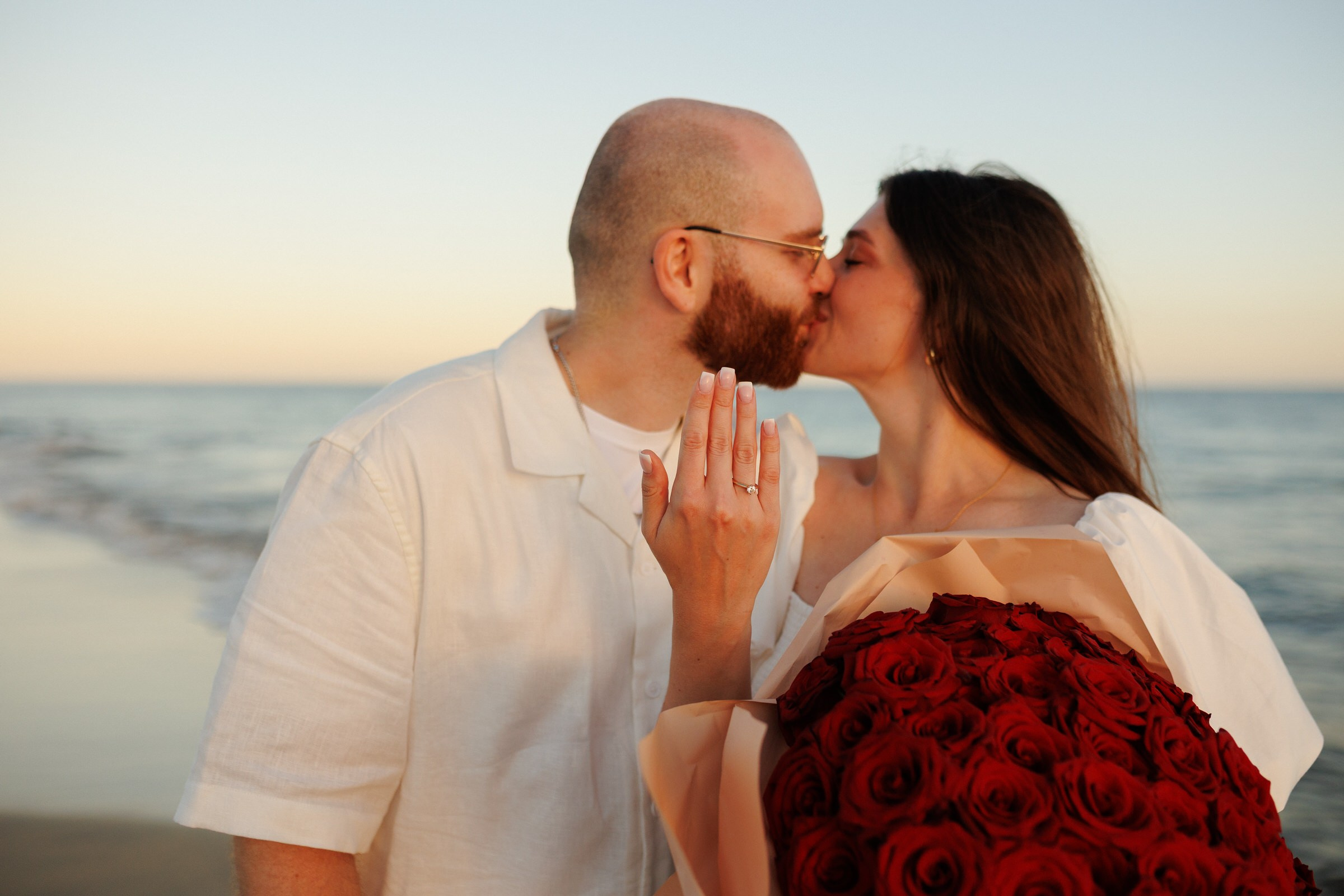 Couple kissing on the beach after a proposal in Gran Canaria