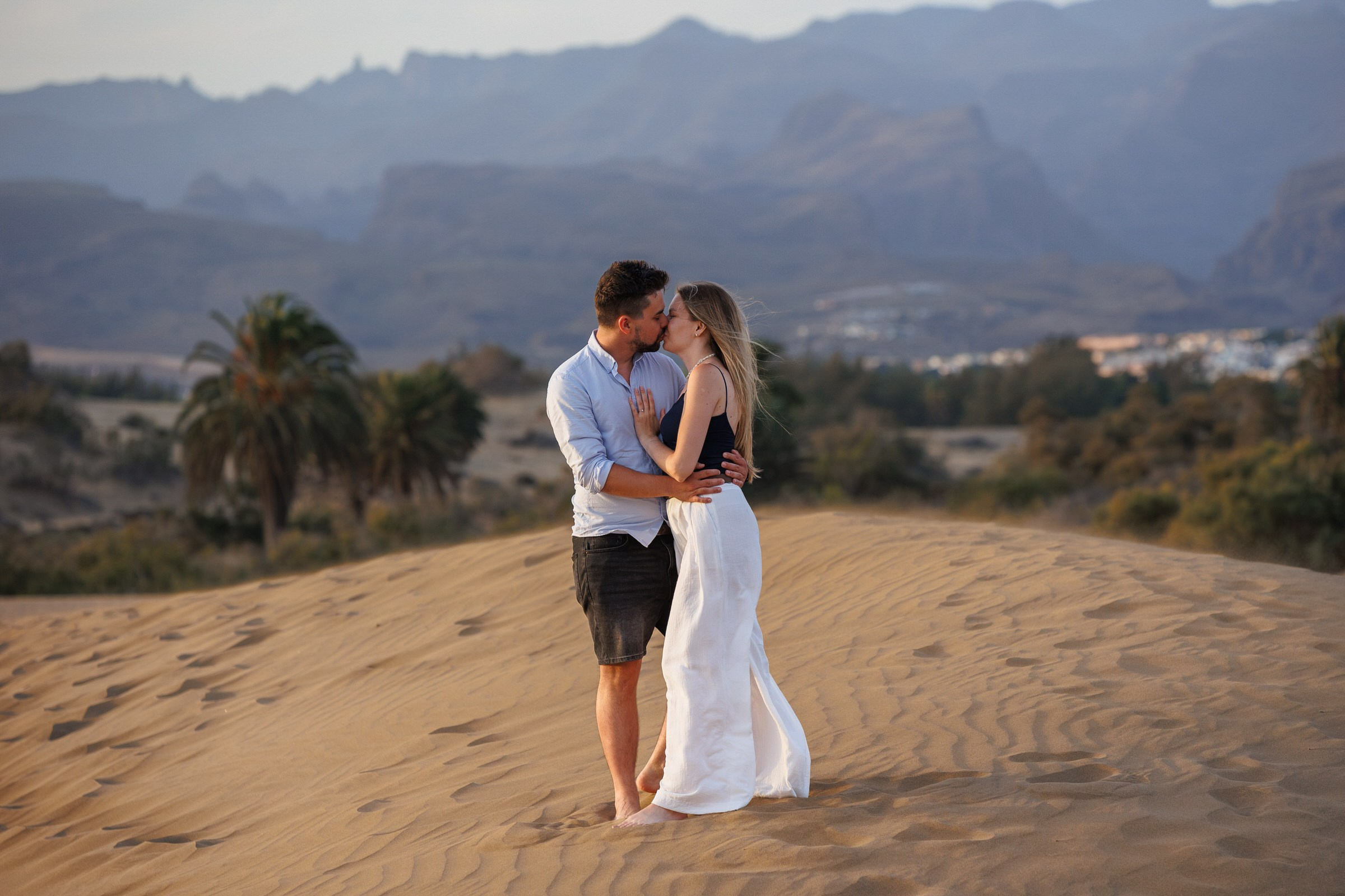 Couple embracing on Maspalomas dunes after a proposal, Gran Canaria