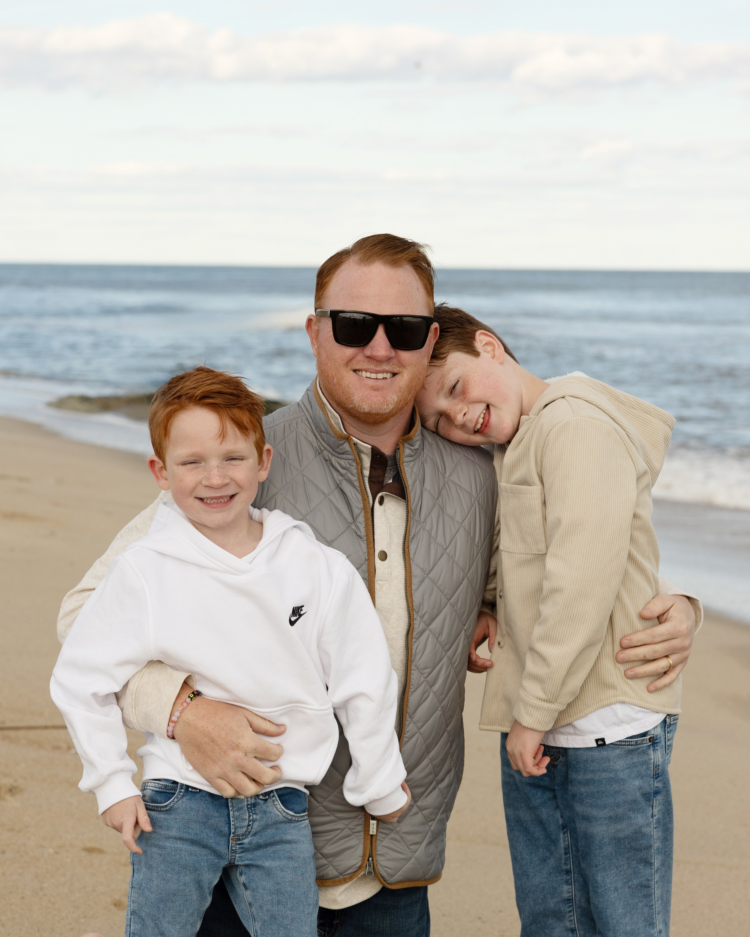 Sun, Sand, and Family Hugs. Family, lifestyle, and commercial photography in New York and New Jersey