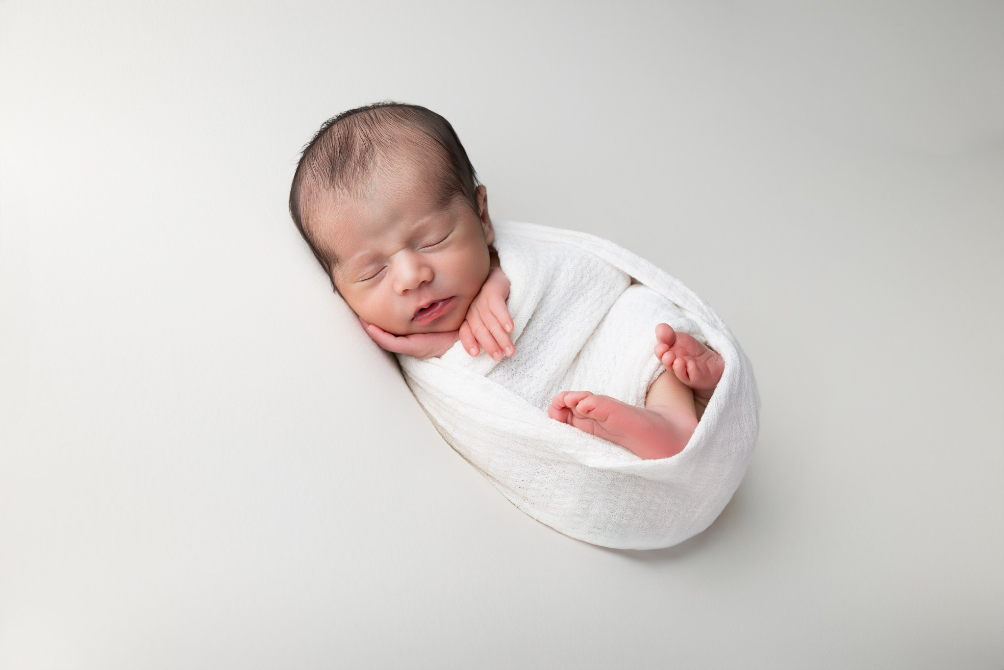 Adriel Newborn Photoshoot. Professional family, maternity & newborn photographer in North Charleston, SC, creating timeless portraits