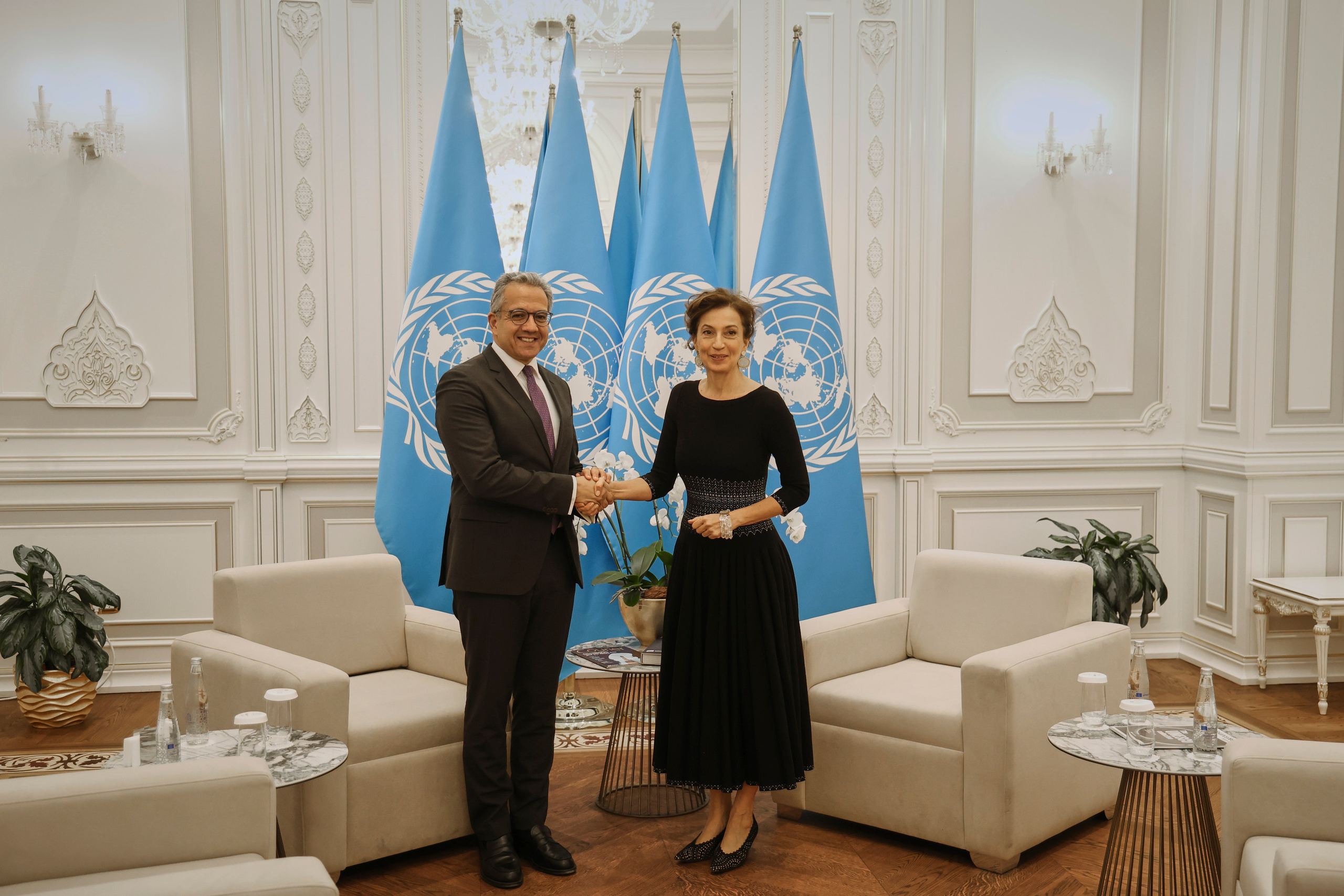 Photographer Djasur Marupov capturing moments at UNESCO conference in Samarkand