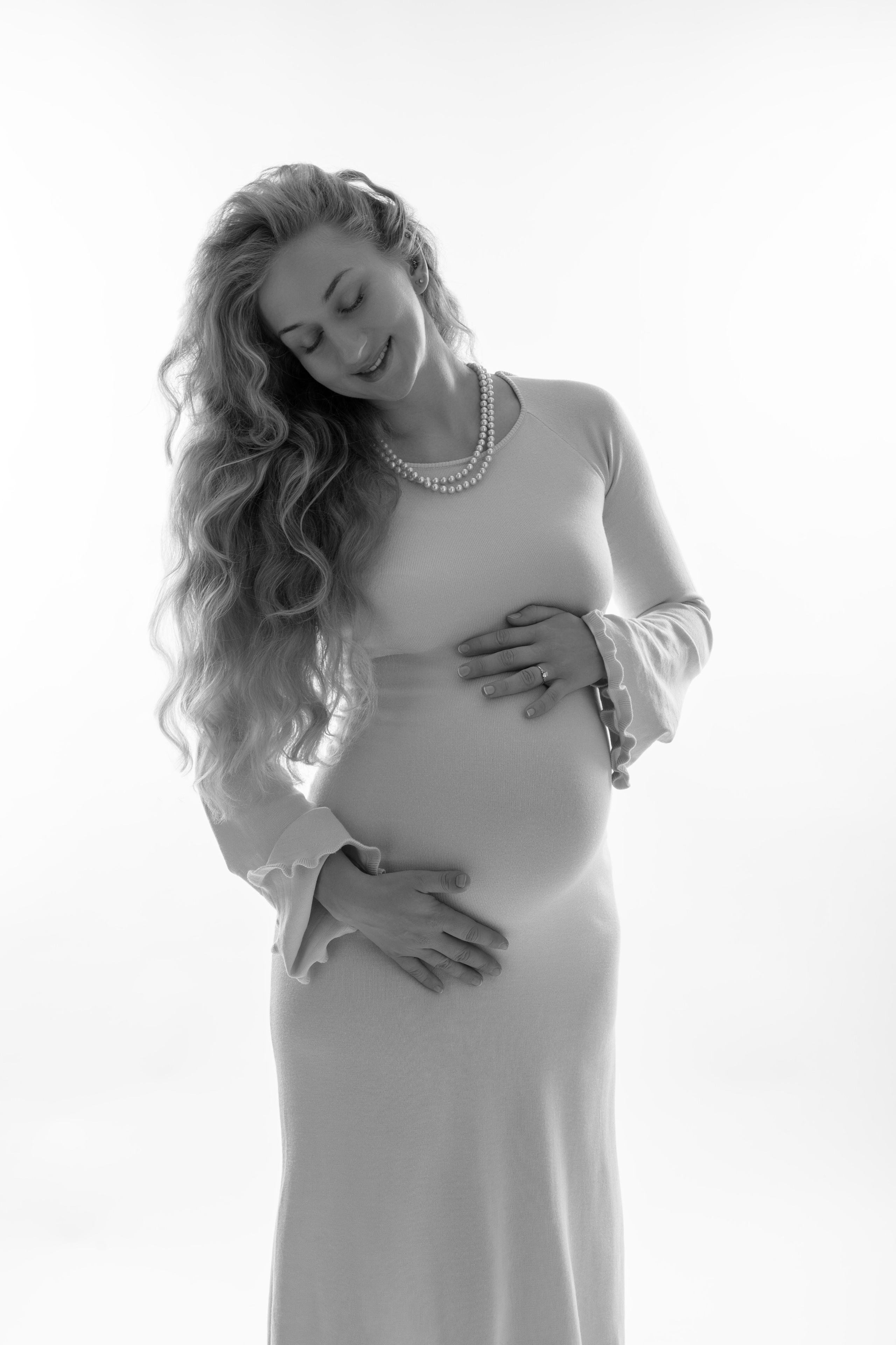 servizio fotografico gravidanza Padova donna incinta in studio luce naturale
