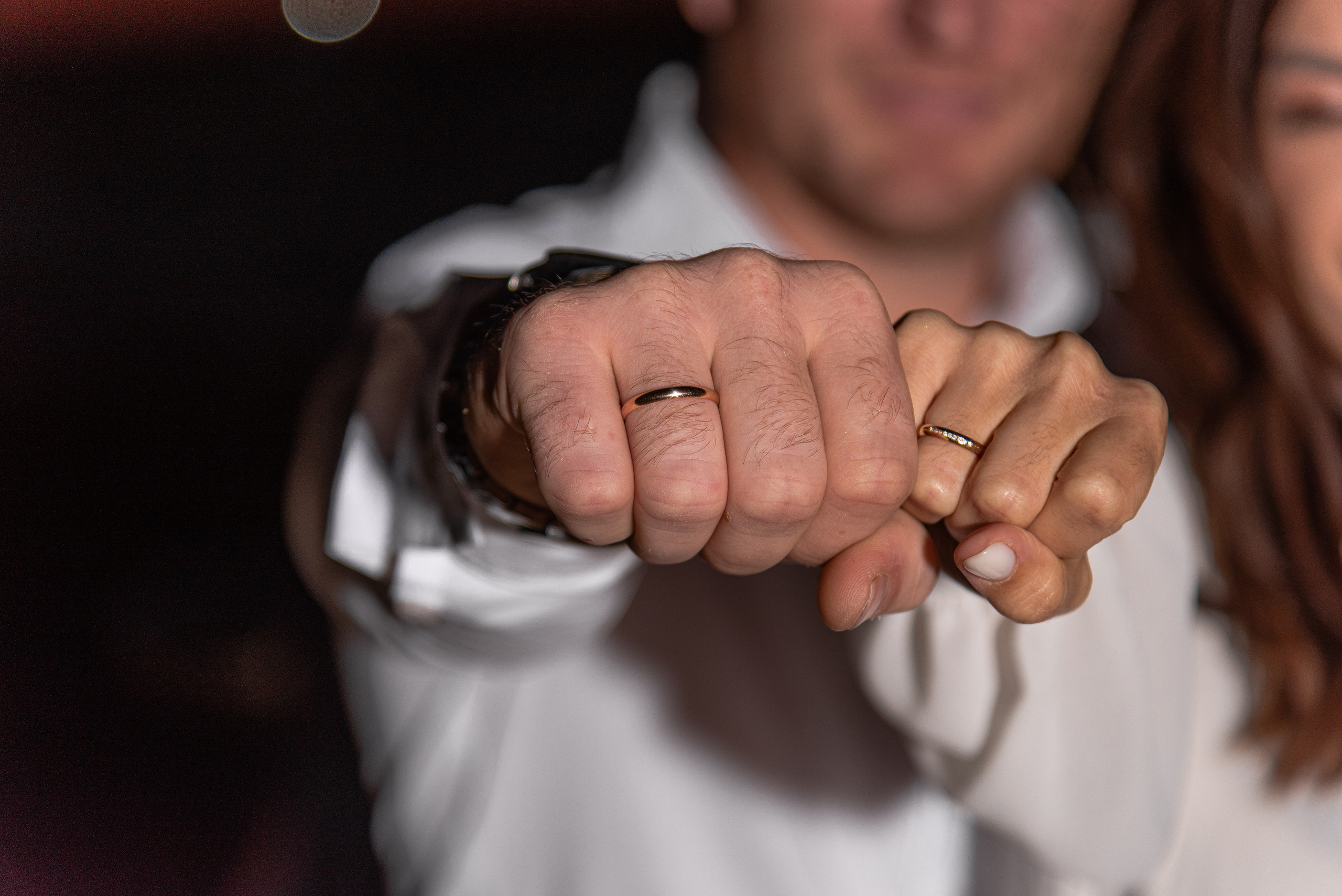 Newlyweds show rings on their hands