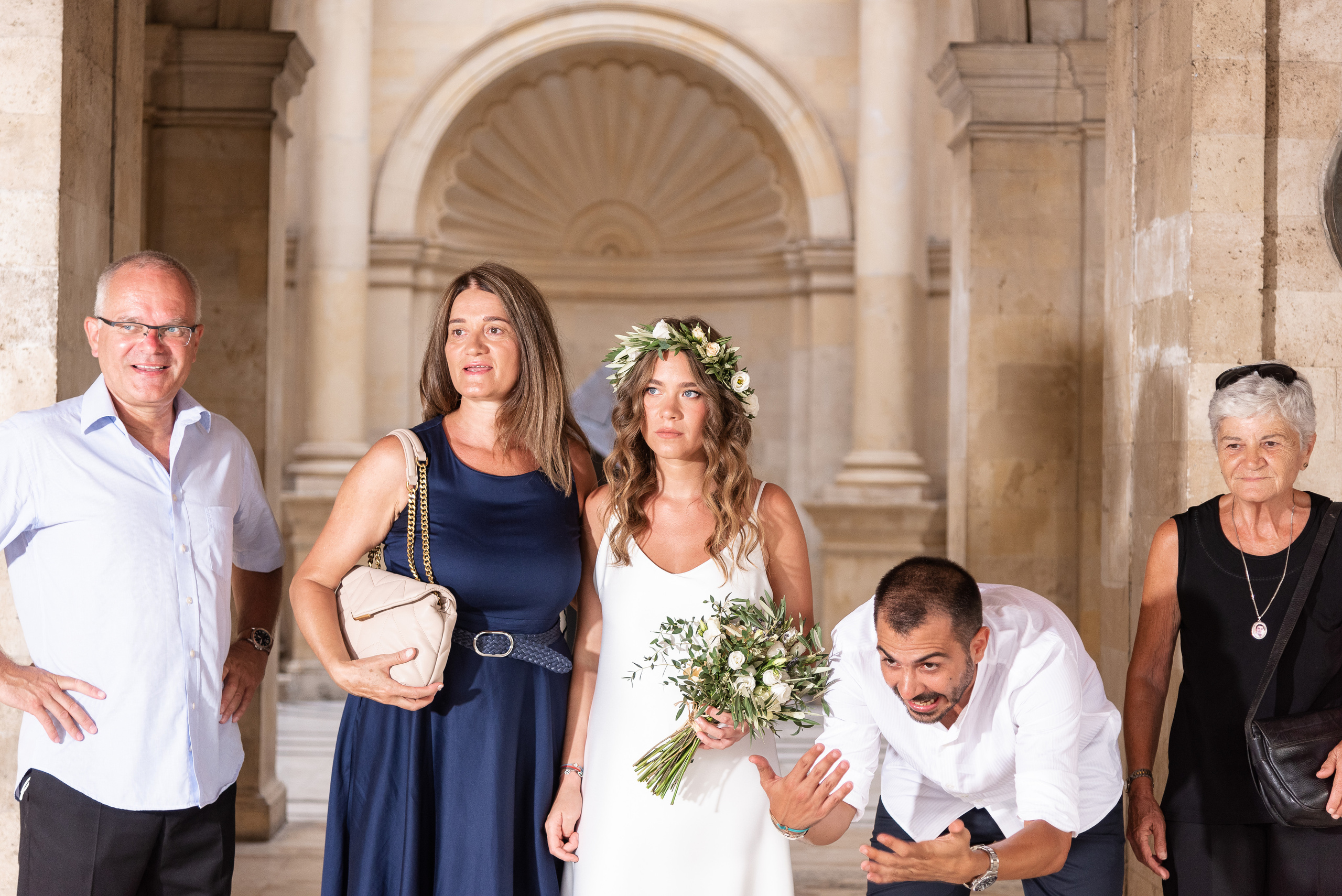 Wedding photographer in Heraklion family photo on the background of Byzantine frescoes
