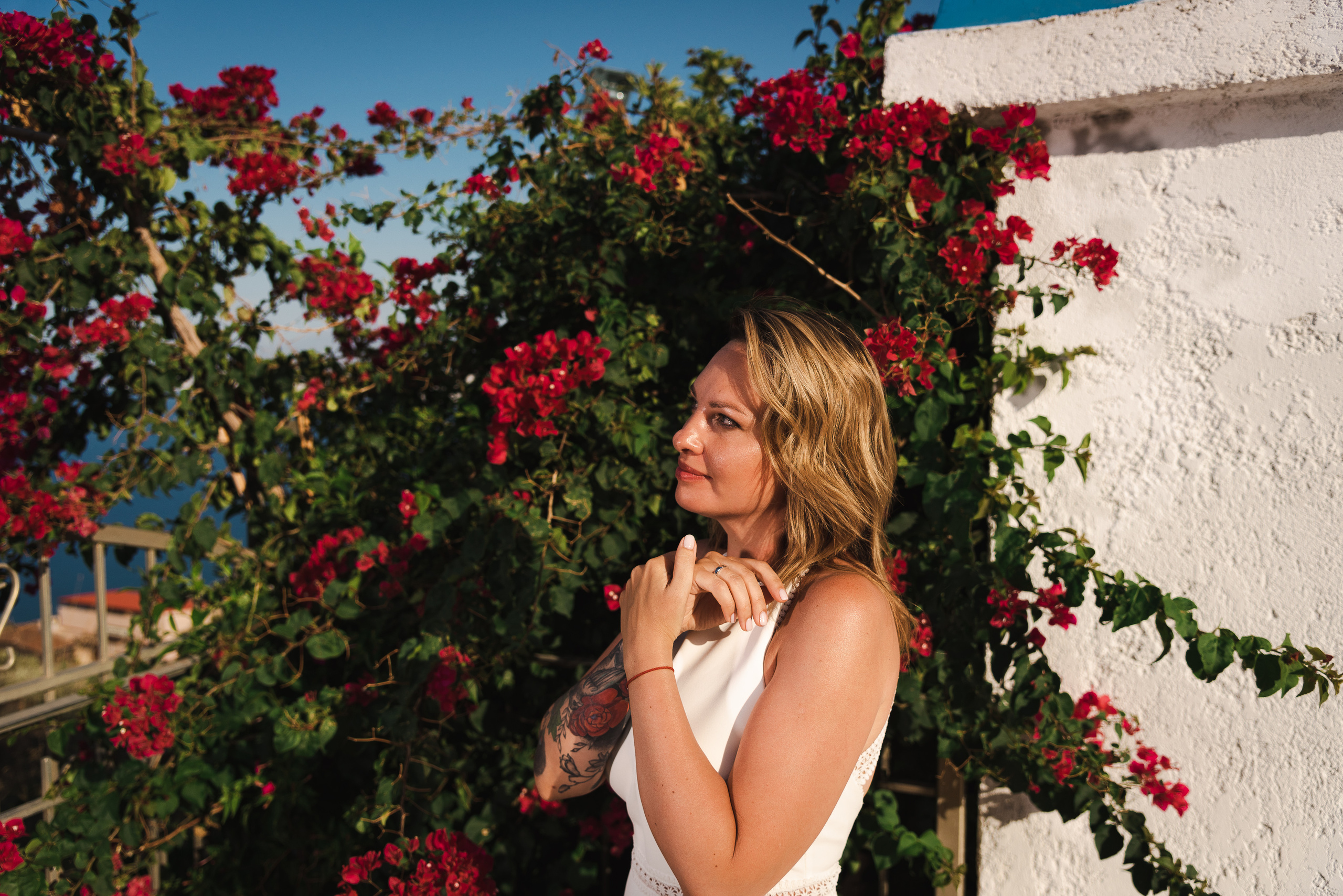 The bride on a background of red flowers