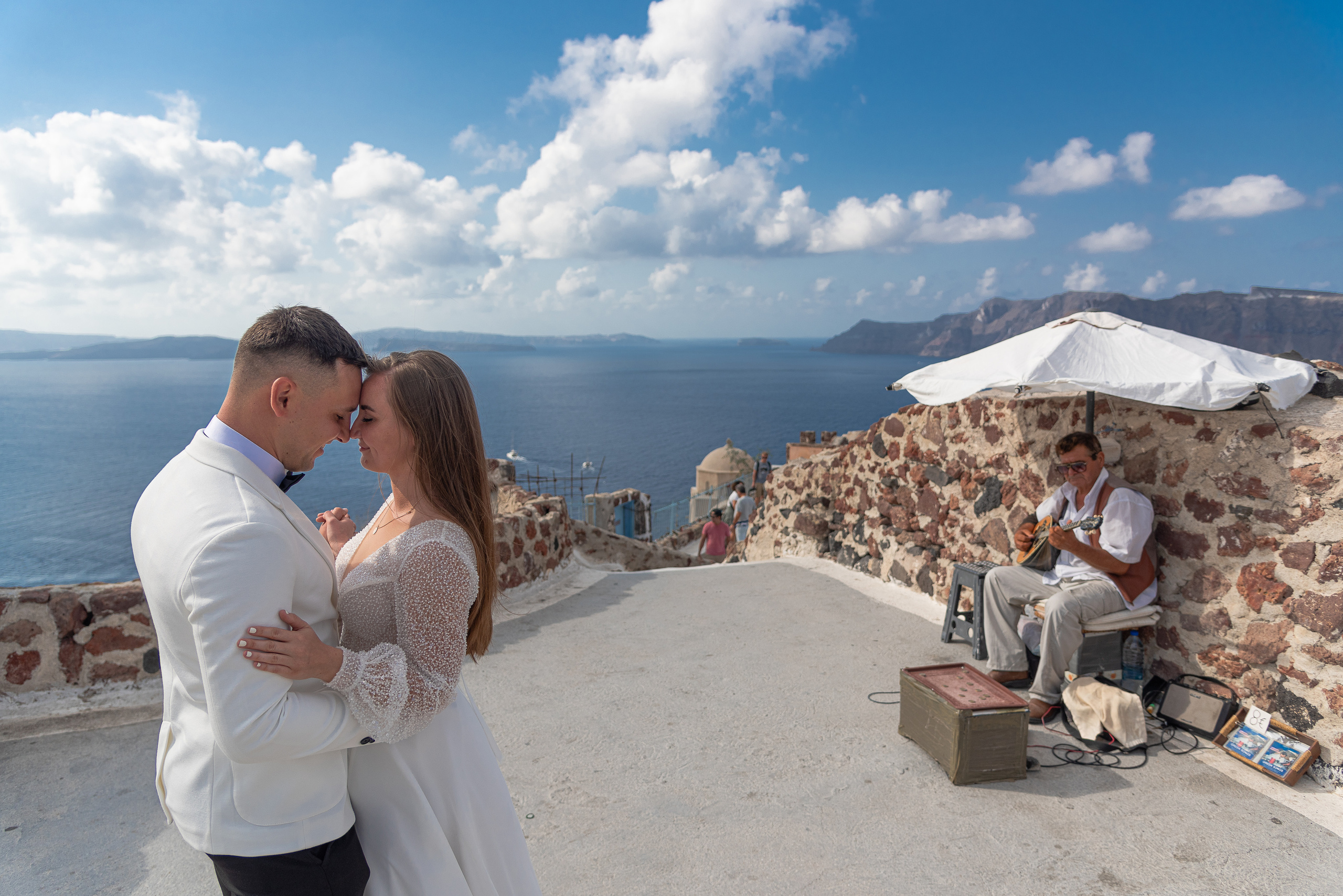 Bride and groom dancing in Santorini