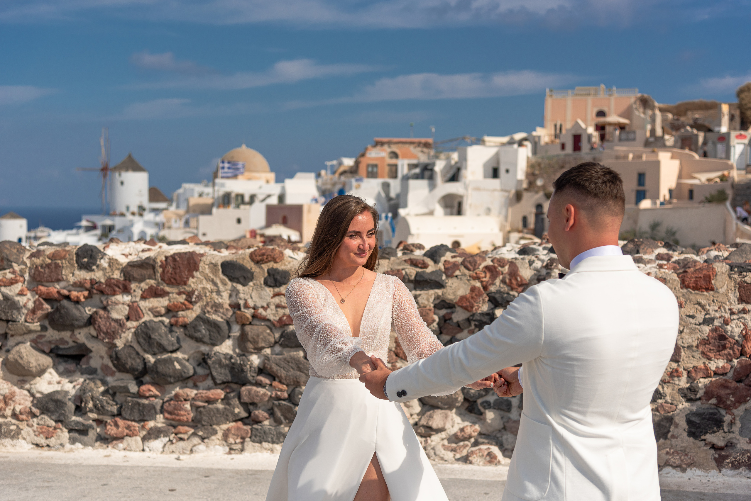 Wedding photo shoot in Santorini couple in white