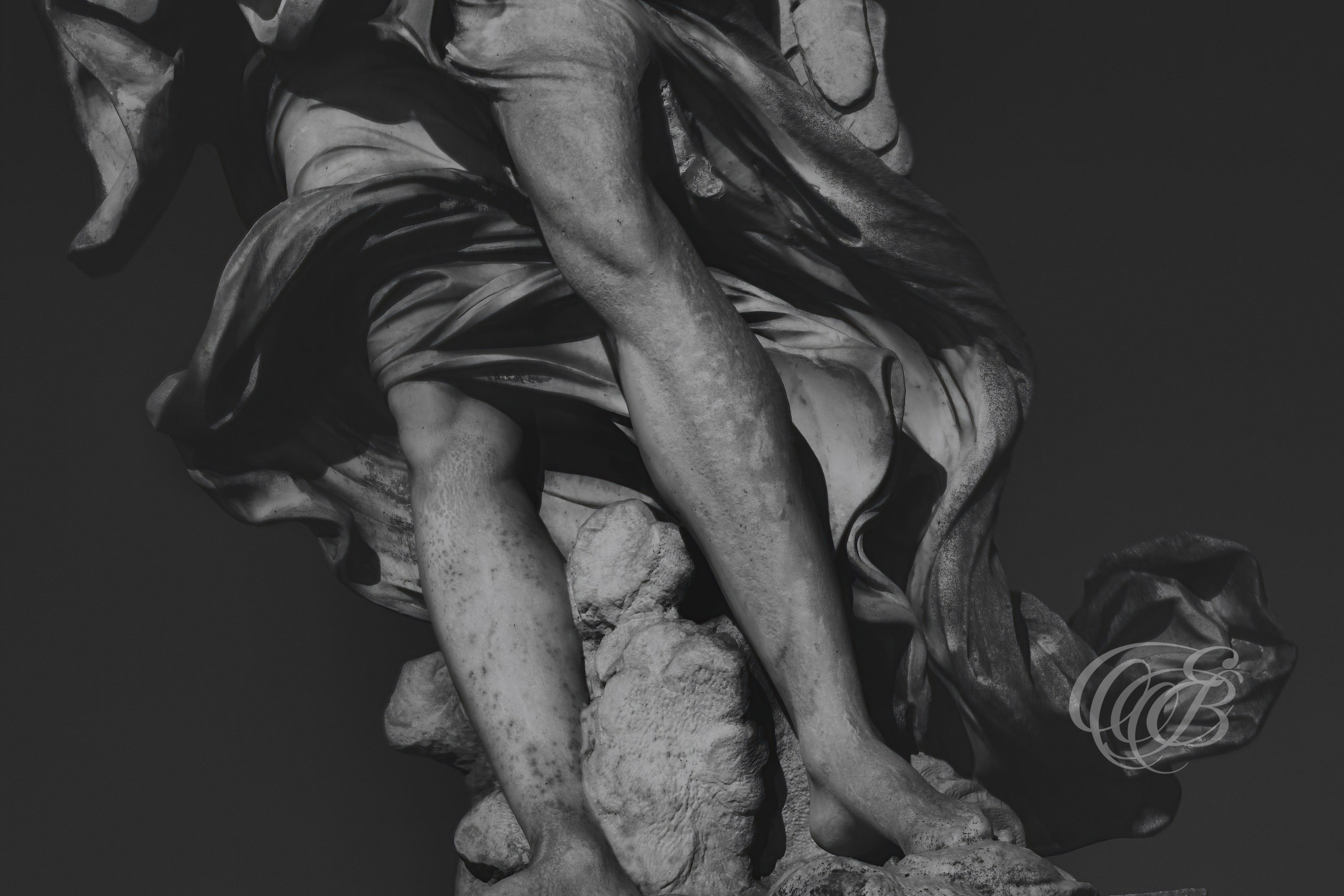Rome Italy - Angel's Feet at Ponte Sant'Angelo - Eduardo Bartoli Fine Art Photography - Black and white fine art photograph of the feet of the angel statue at Ponte Sant'Angelo in Rome, Italy – photography by Eduardo Bartoli.