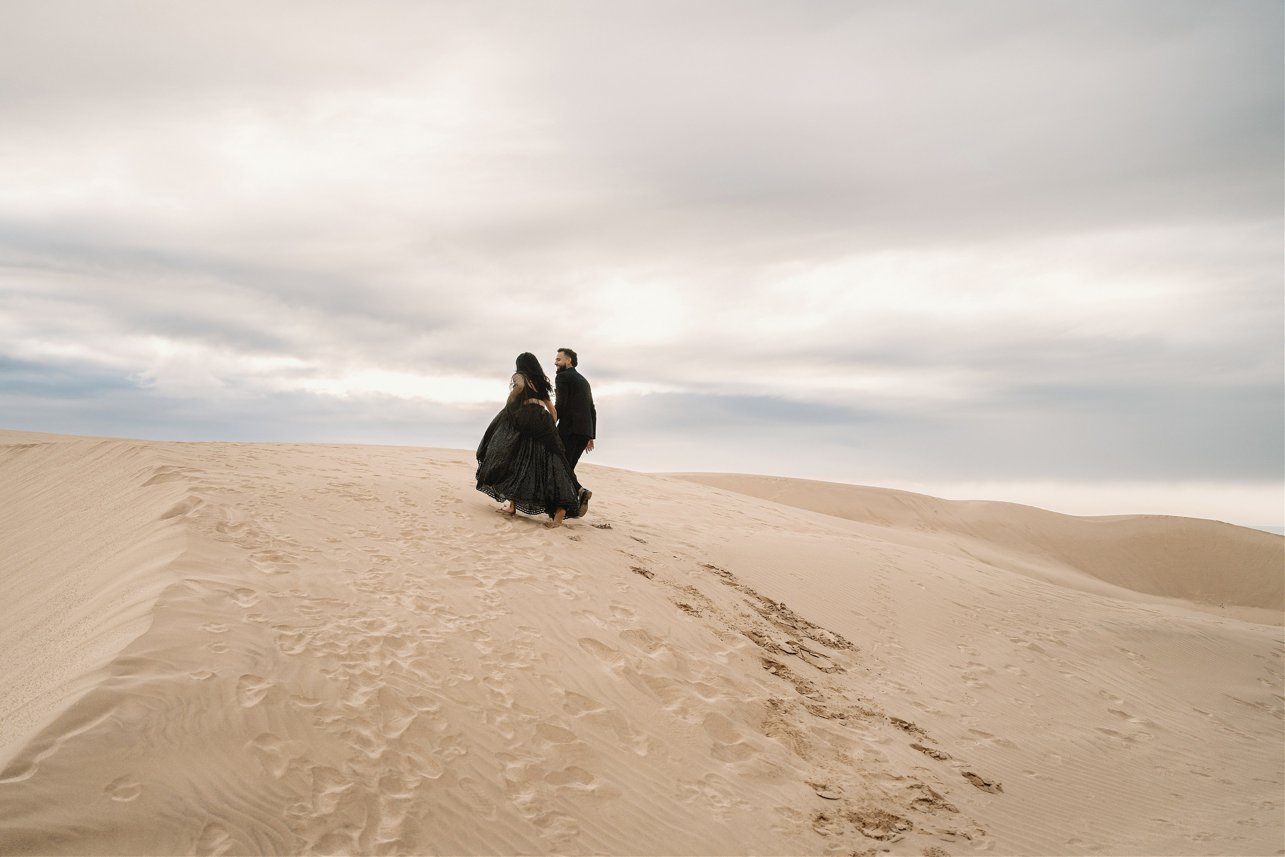 Elopement at Pismo Beach Sand Dunes, California. Wedding Photography & Videography Team in California, Los Angeles, San Francisco, San Diego and Travel