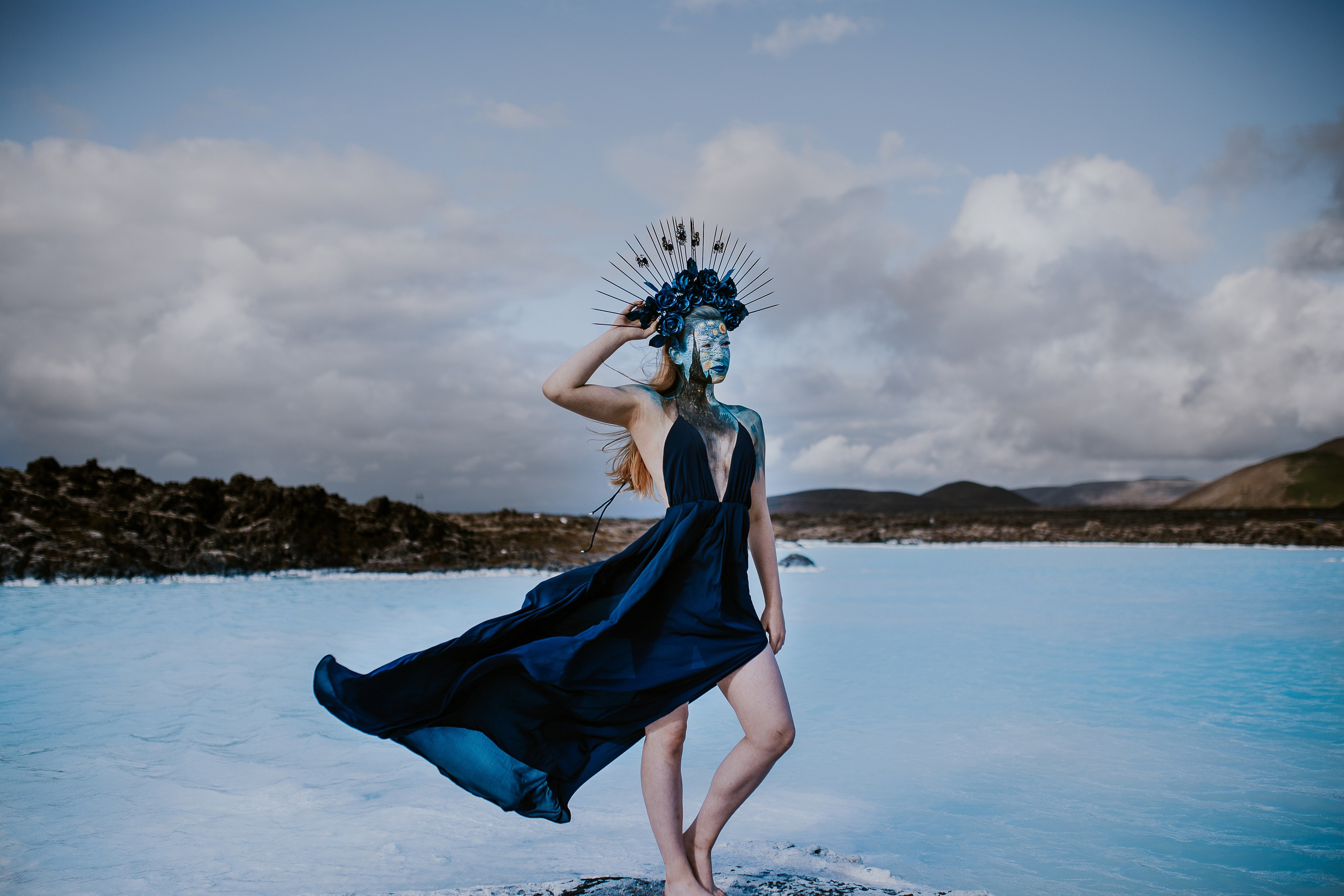 Feminine beauty meets Icelandic wilderness in a stunning outdoor portrait session.