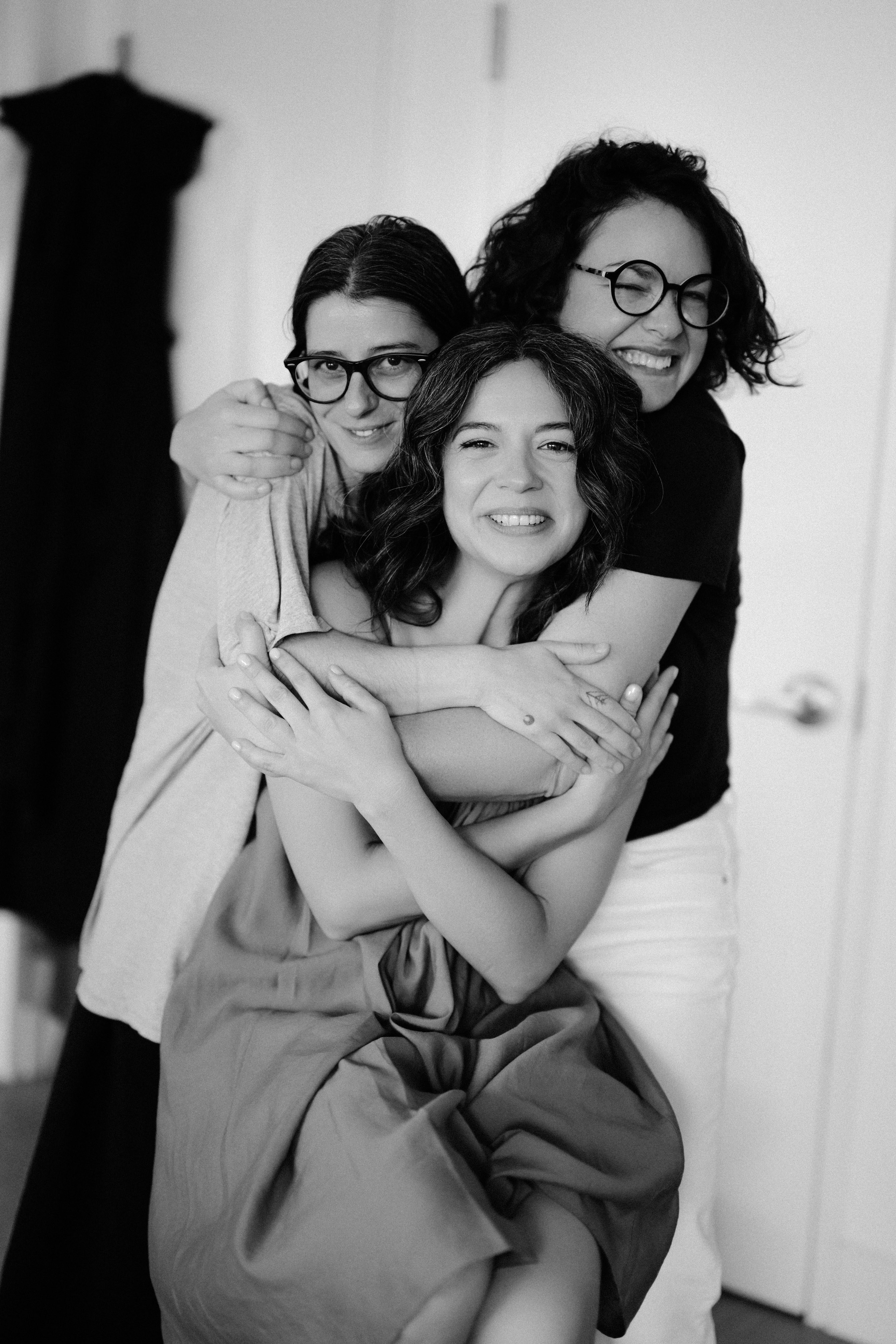 two women hugging each other women