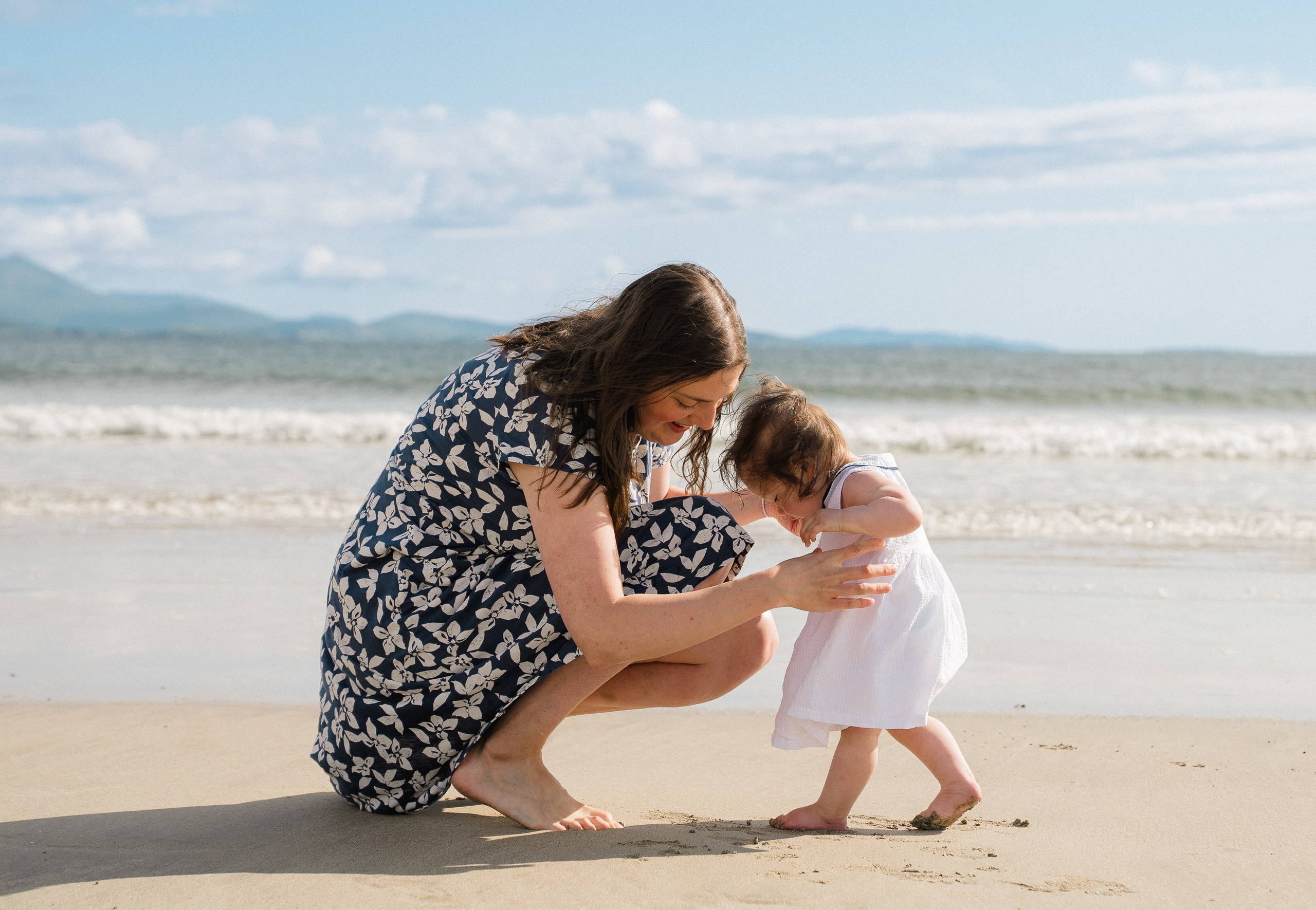 Darya and Mia at the ocean. Wedding and family photographer Ireland