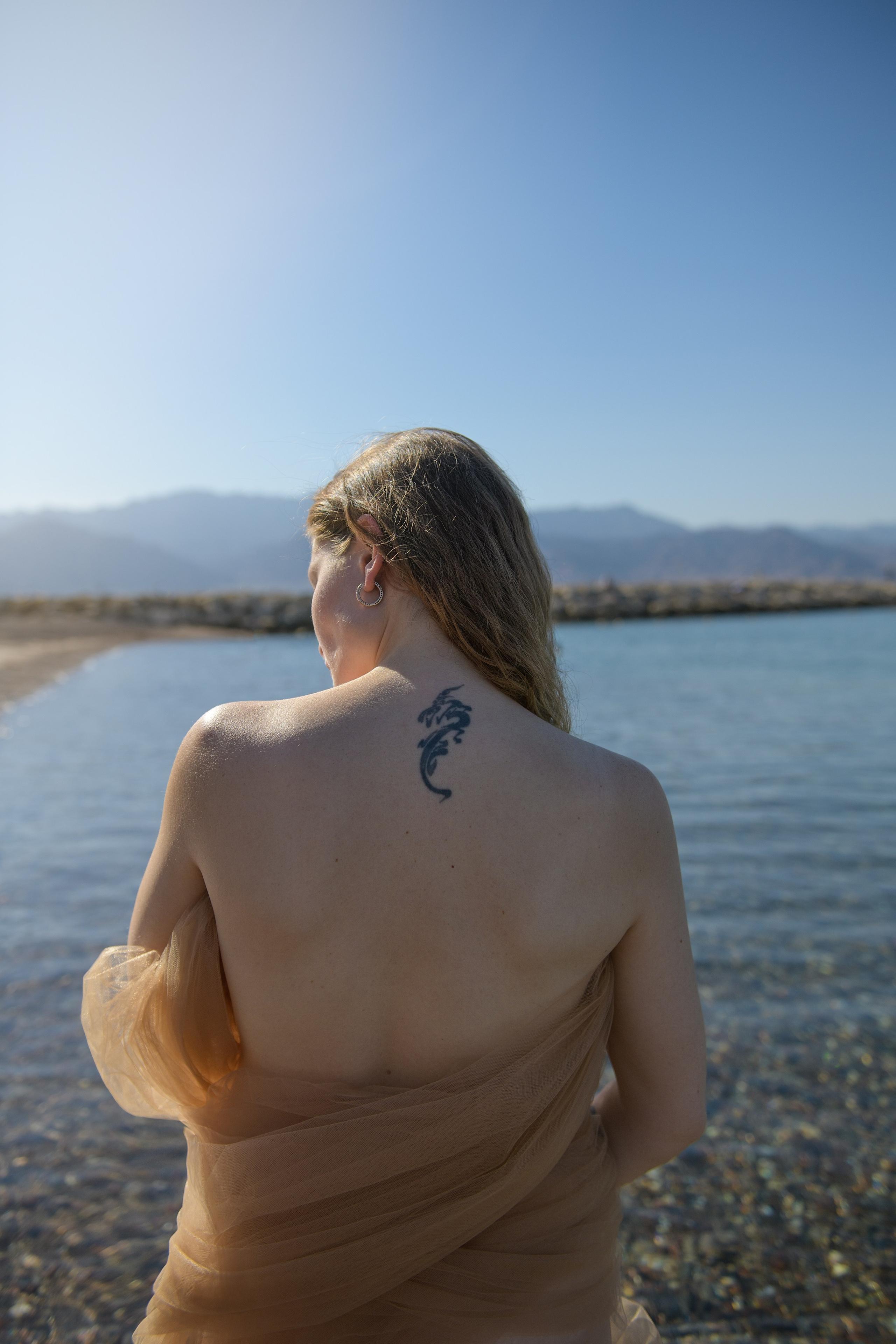 Julia & Dmitriy pregnancy photoshoot on the Red seacoast. צלמת משפחה ילדים הריון וסיפורי אהבה באילת ישראל אולגה אמצ'יסלבסקי