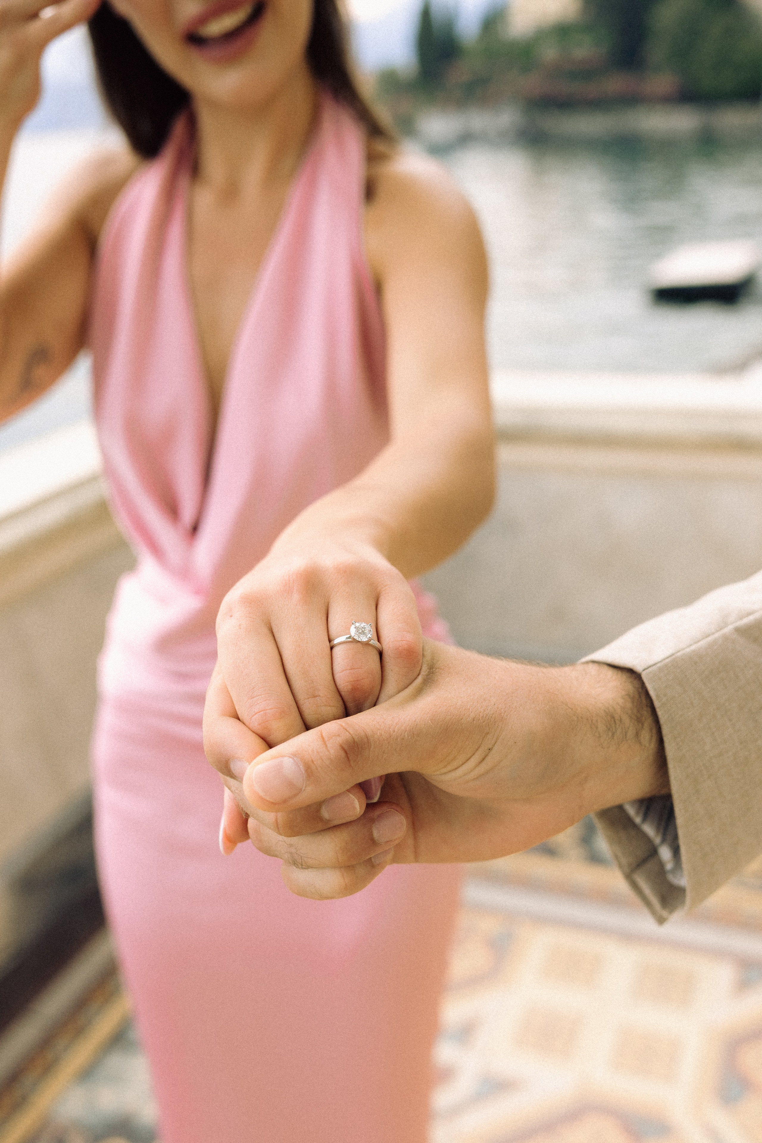 Newly engaged couple enjoying a romantic photoshoot on Lake Como