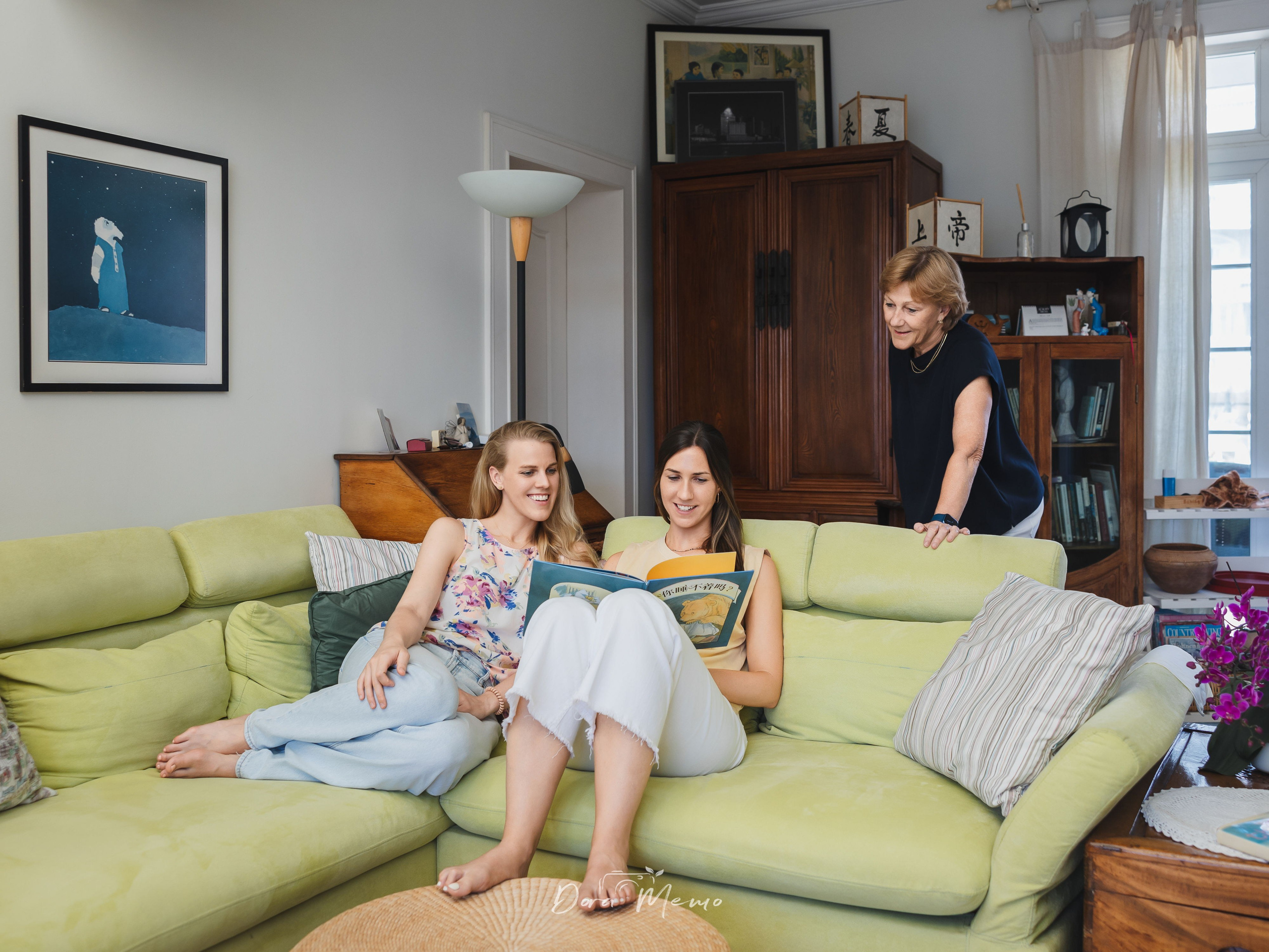 A bright living room with Chinese furniture during an at-home family photography session in Shanghai.