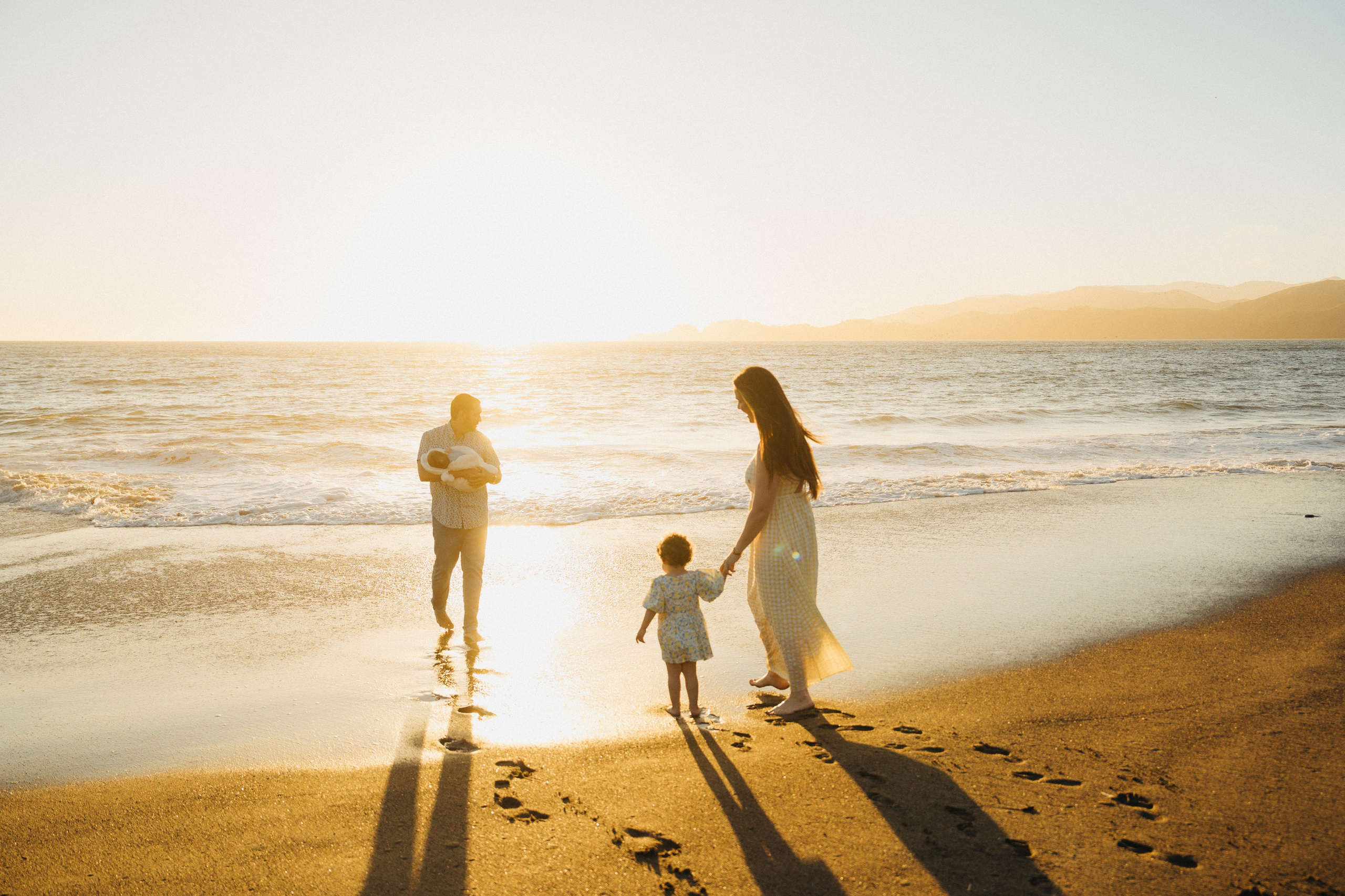 Bri’s growing family at Baker Beach. Soulo Photography | San Francisco Bay Area Based Photographer