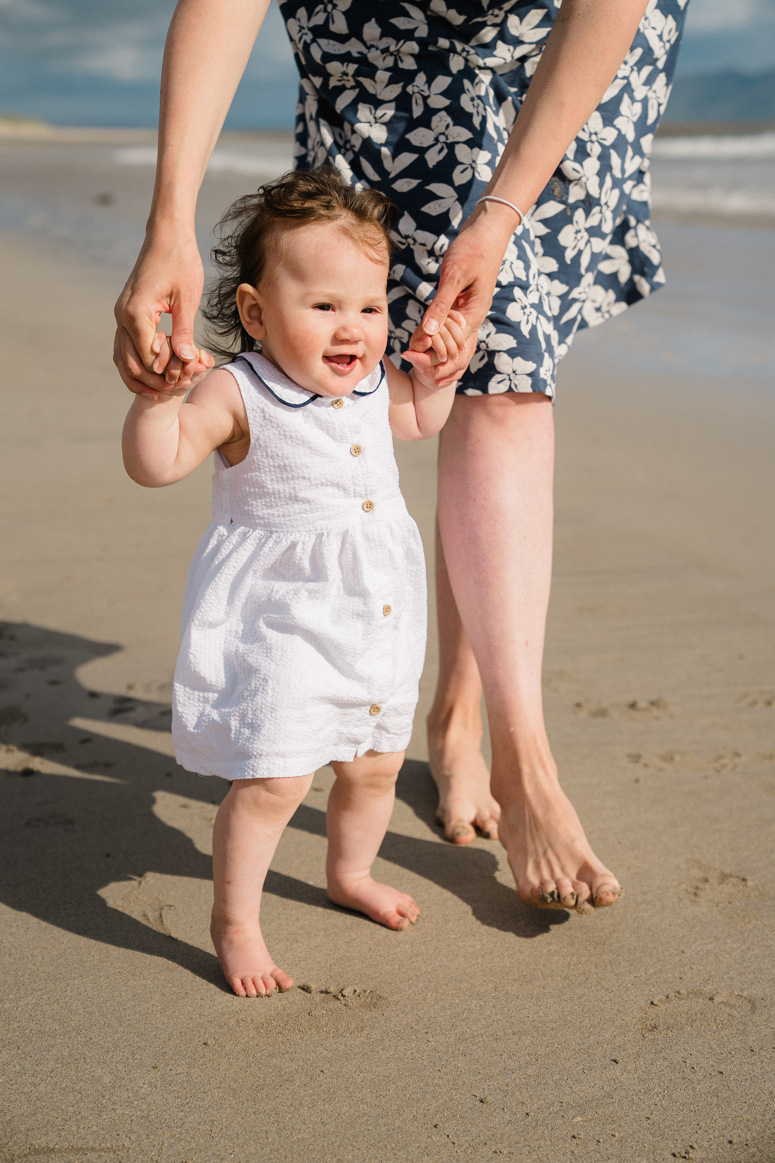 Darya and Mia at the ocean. Wedding and family photographer Ireland